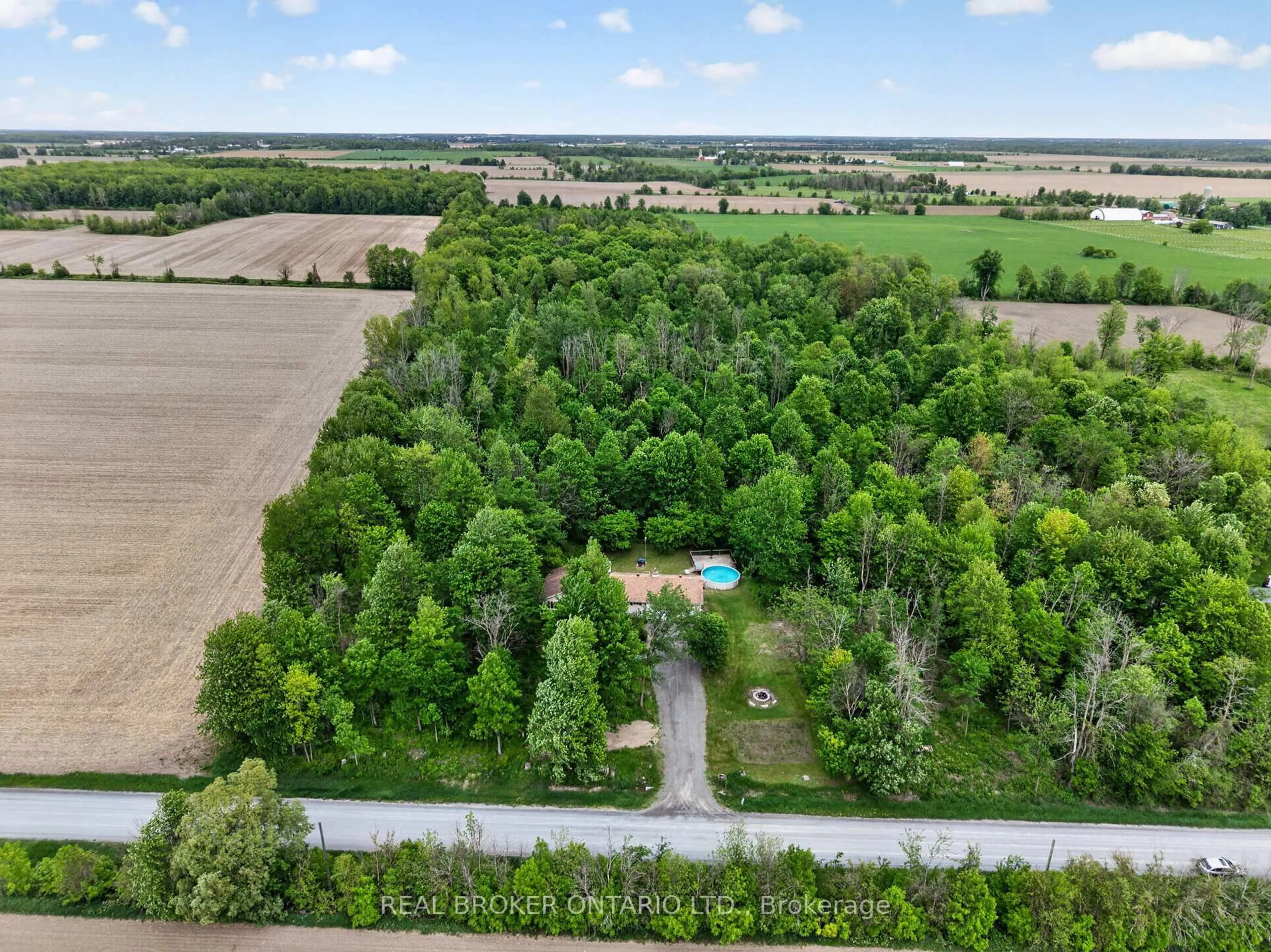 A pic from outside/outdoor area/front of a property/back of a property/a pic from drone, forest/trees view for 4393 Dalmac Rd, Osgoode Ontario K0A 2W0