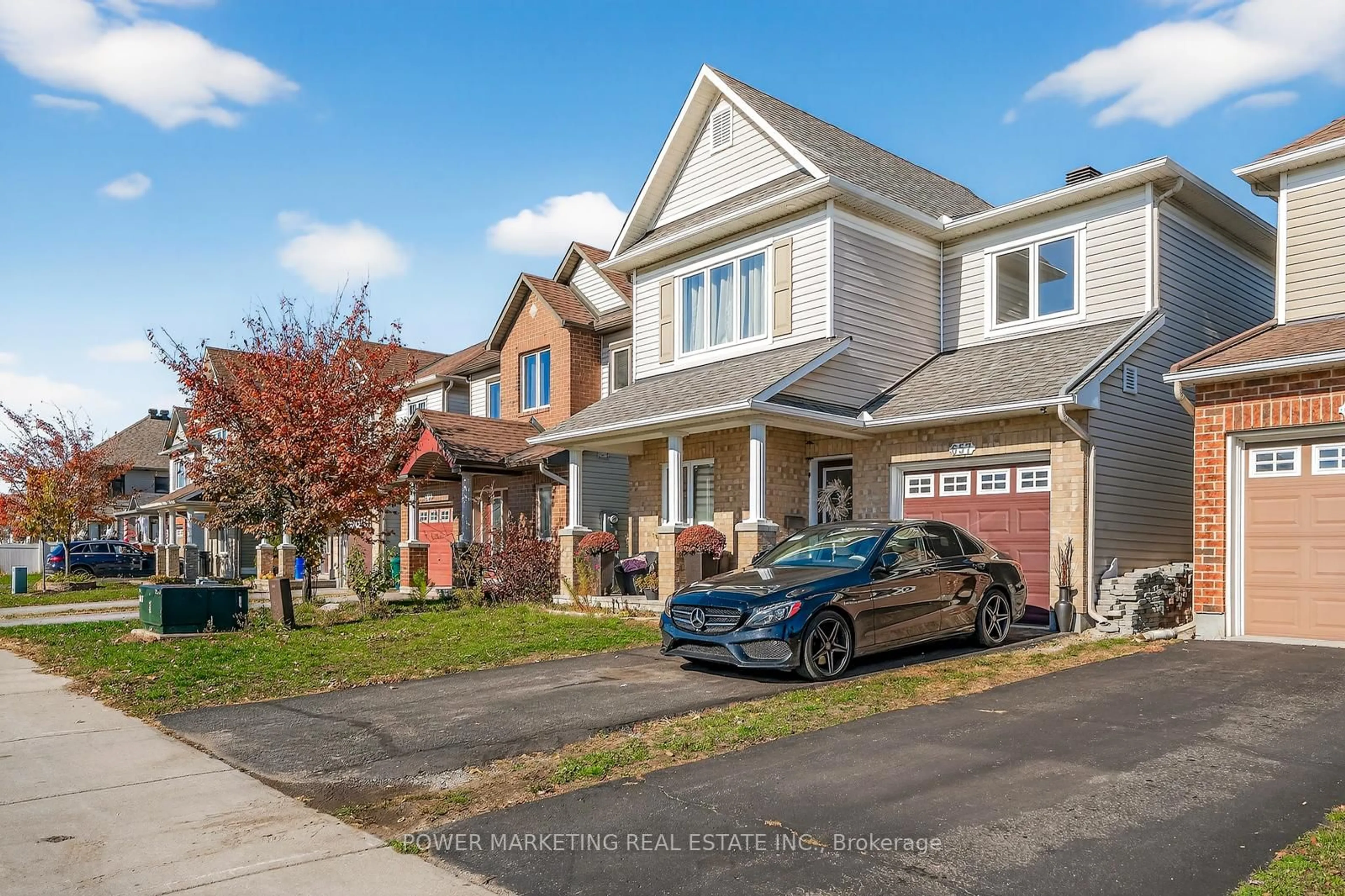 Home with vinyl exterior material, street for 657 Clearbrook Dr, Ottawa Ontario K2J 5S1