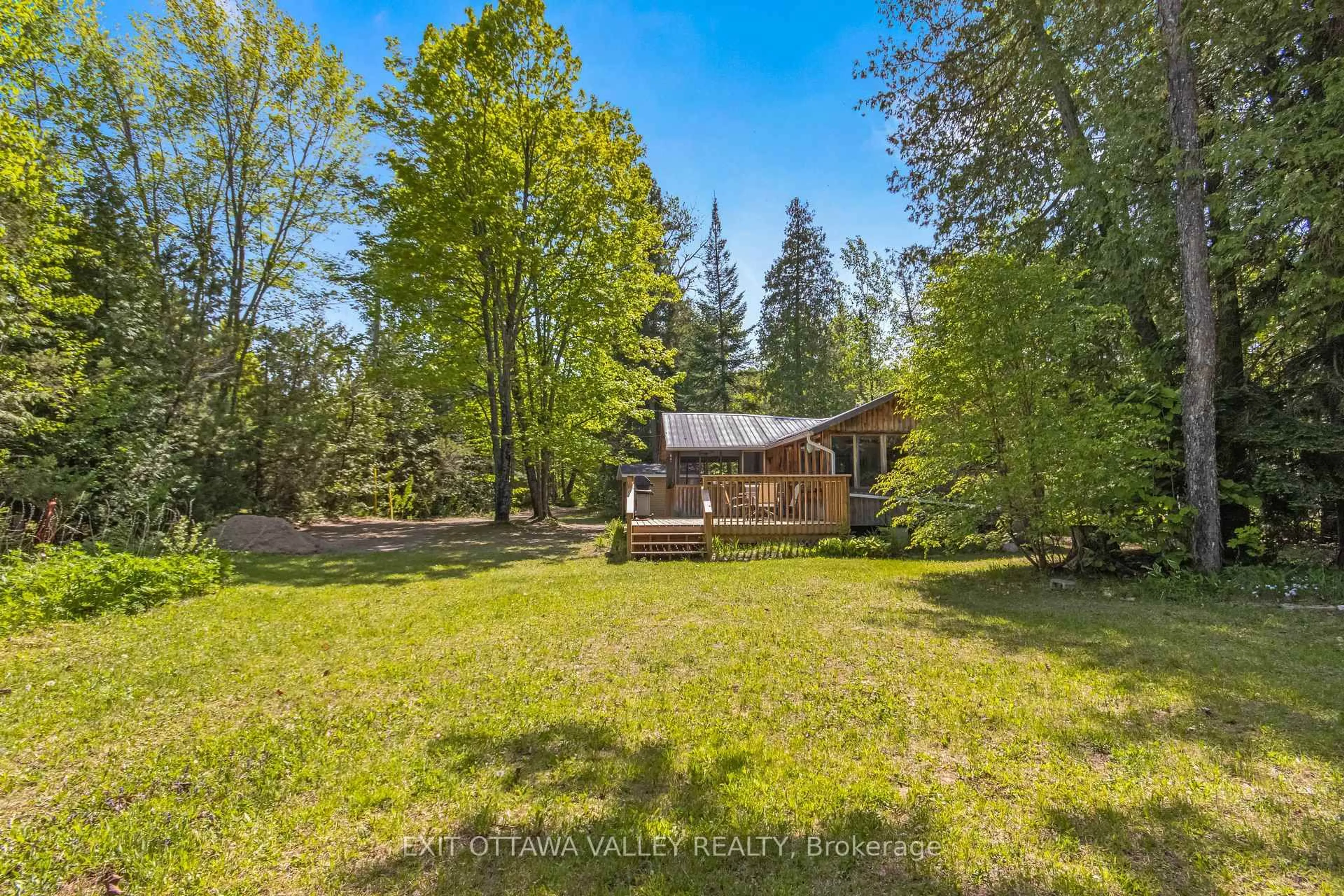A pic from outside/outdoor area/front of a property/back of a property/a pic from drone, forest/trees view for 112 Arbor Vitae Rd, Barry's Bay Ontario K0J 1B0