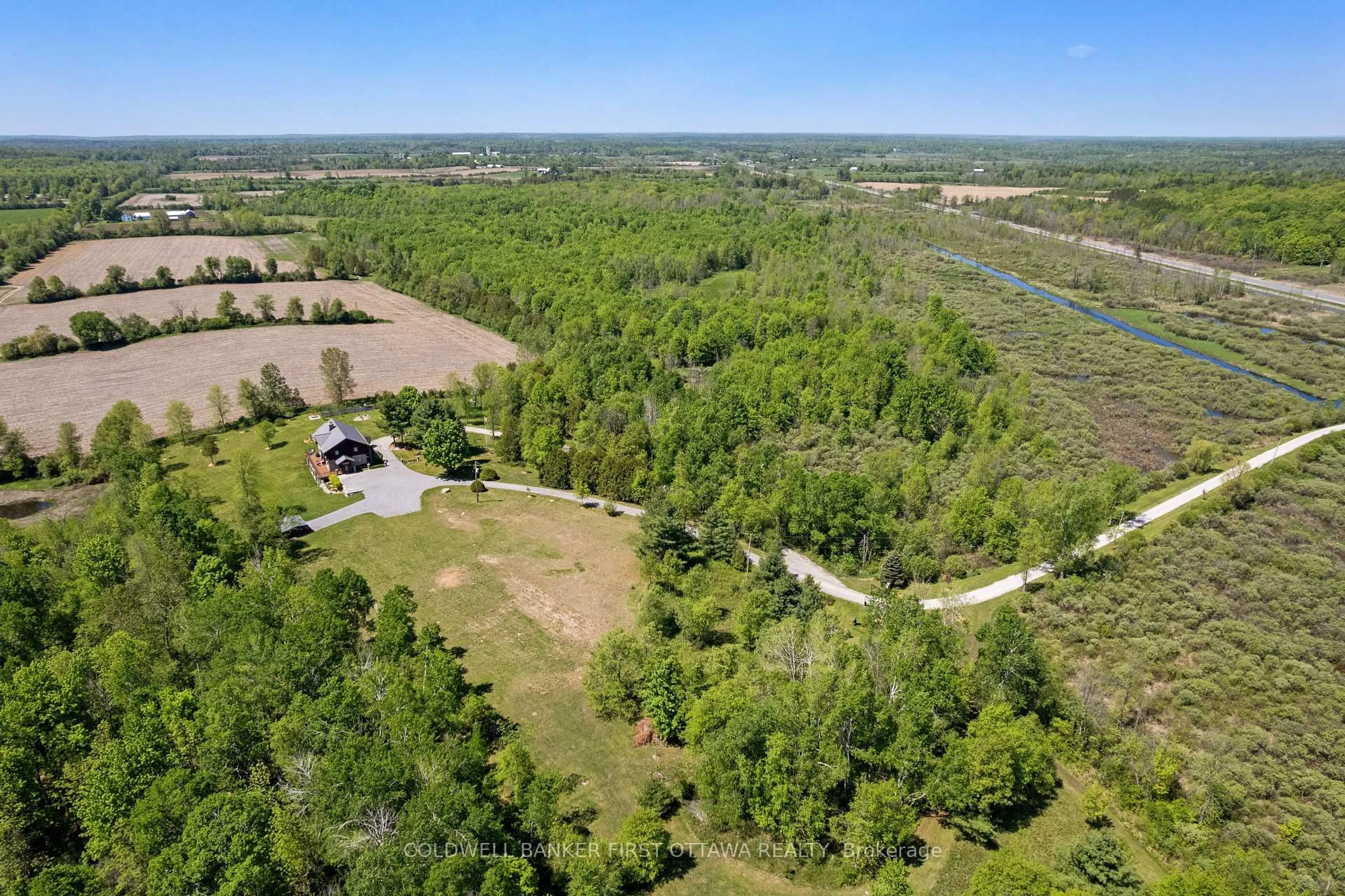 A pic from outside/outdoor area/front of a property/back of a property/a pic from drone, water/lake/river/ocean view for 19067 Highway 7, Perth Ontario K7H 3C6