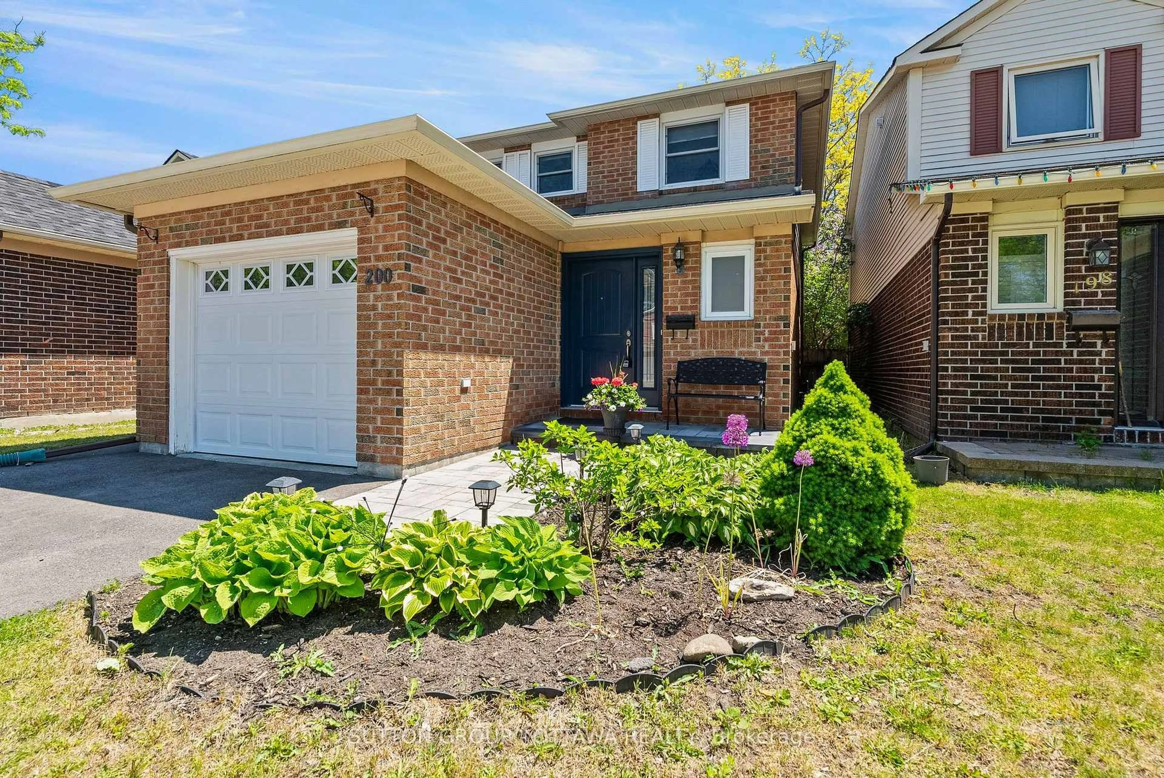 Home with brick exterior material, street for 200 McCurdy Dr, Ottawa Ontario K2L 2L6