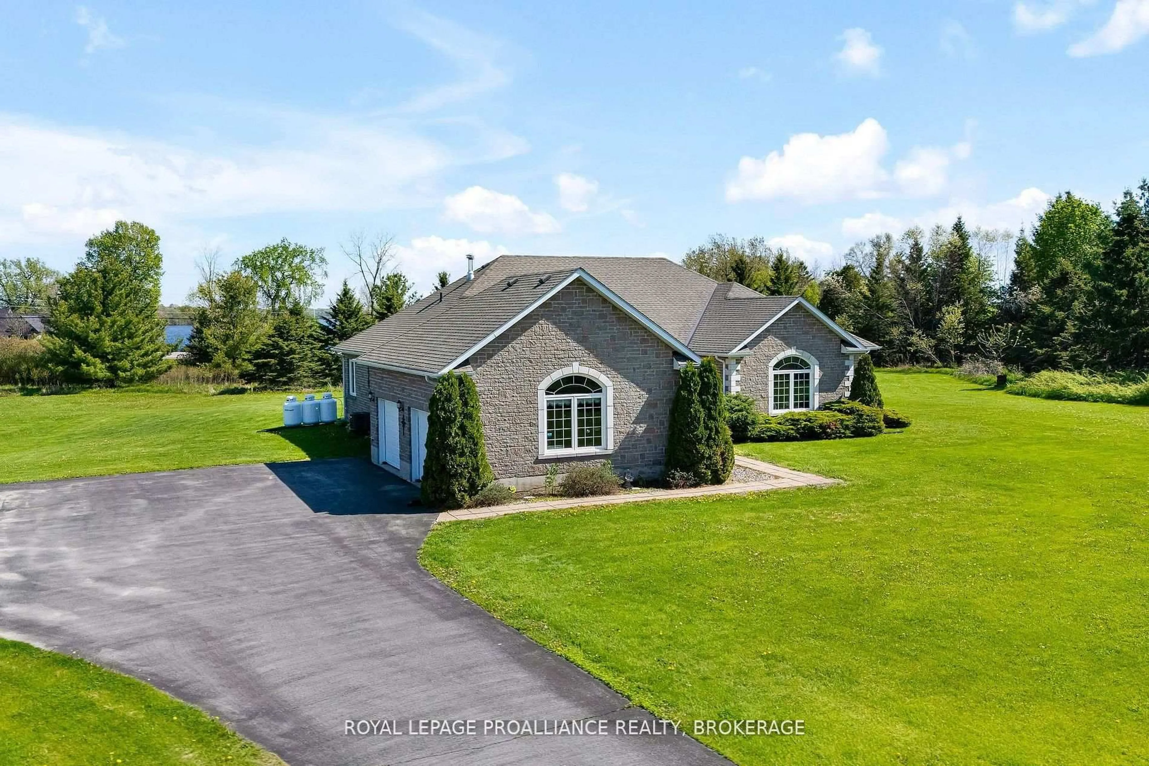 A pic from outside/outdoor area/front of a property/back of a property/a pic from drone, unknown for 61 Conner Dr, Gananoque Ontario K7G 2V4