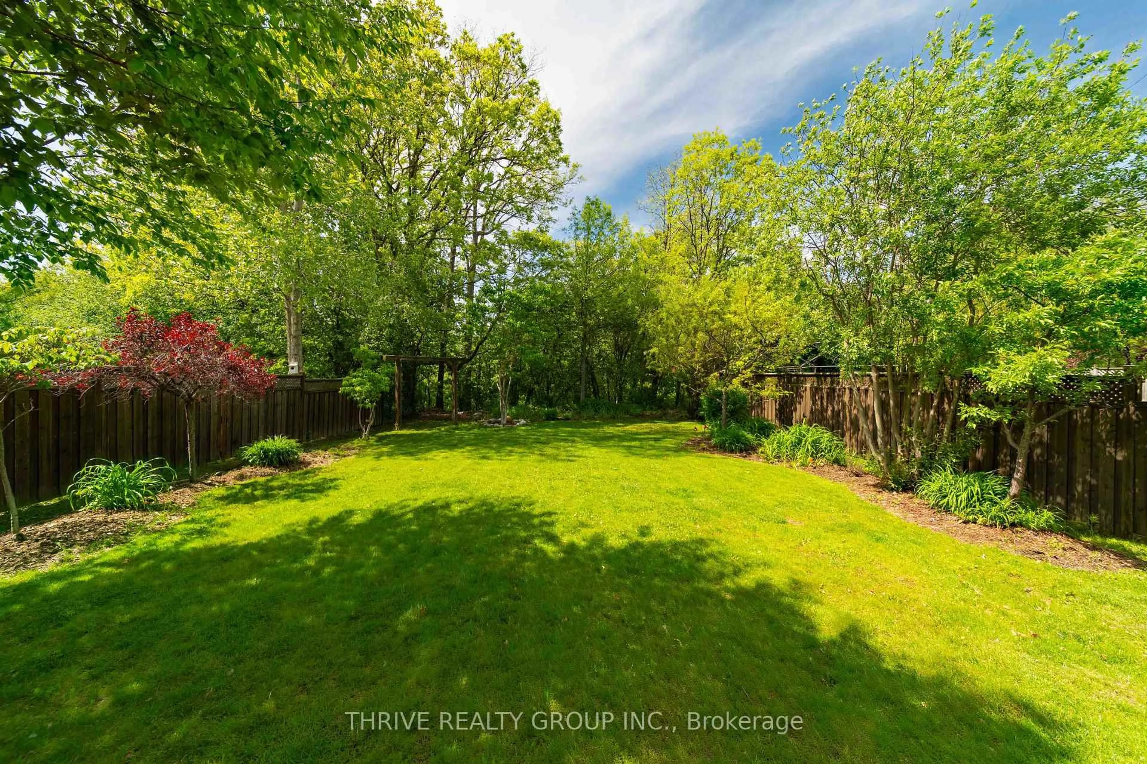A pic from outside/outdoor area/front of a property/back of a property/a pic from drone, forest/trees view for 73 Greenway Blvd, St. Thomas Ontario N5P 4P8