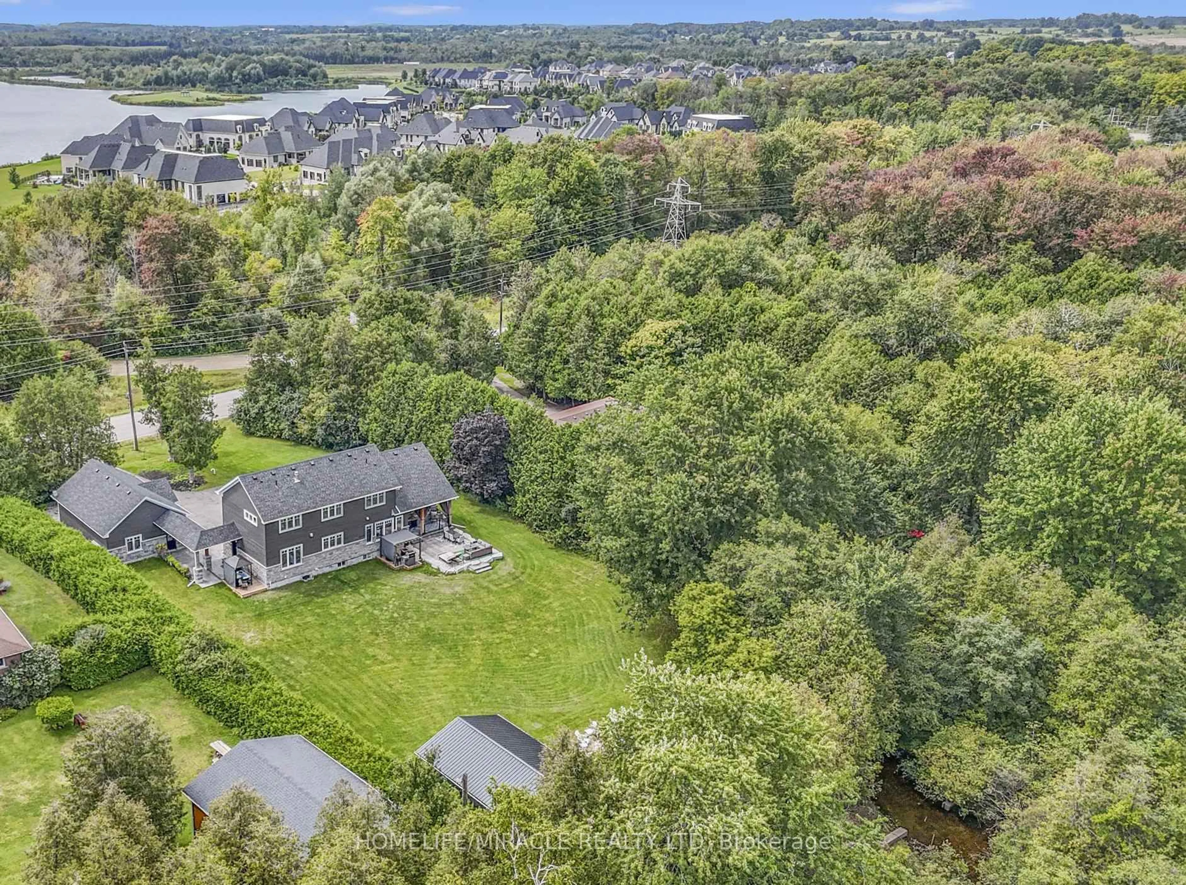 A pic from outside/outdoor area/front of a property/back of a property/a pic from drone, water/lake/river/ocean view for 4427 Concession 7, Puslinch Ontario N3C 2V4