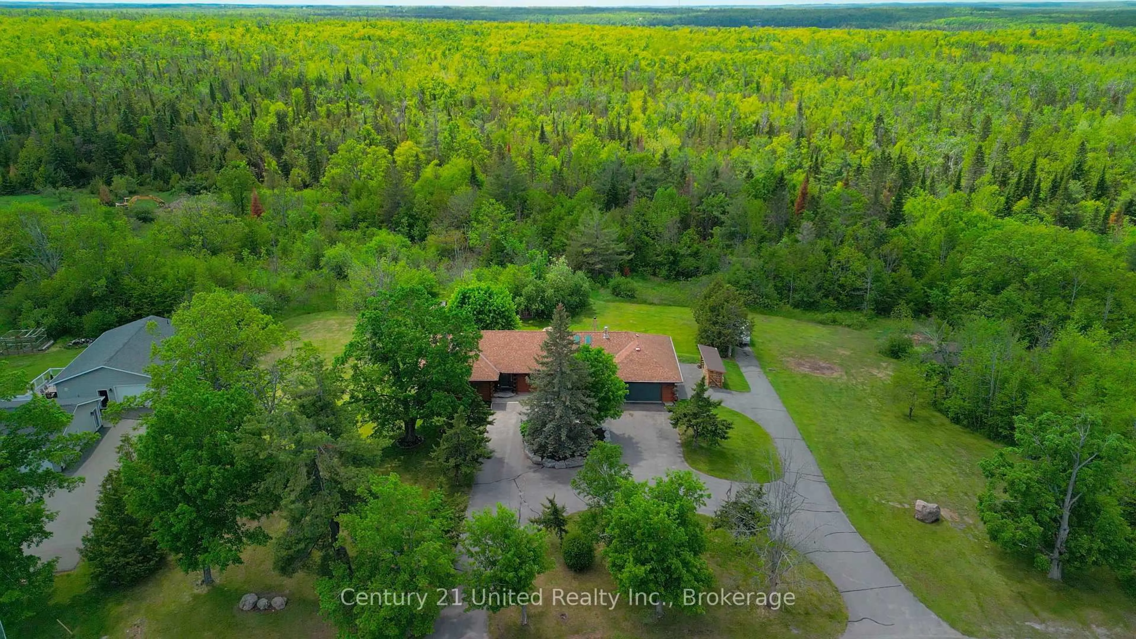 A pic from outside/outdoor area/front of a property/back of a property/a pic from drone, forest/trees view for 65 Laplantes Rd, Trent Lakes Ontario K0L 1J0