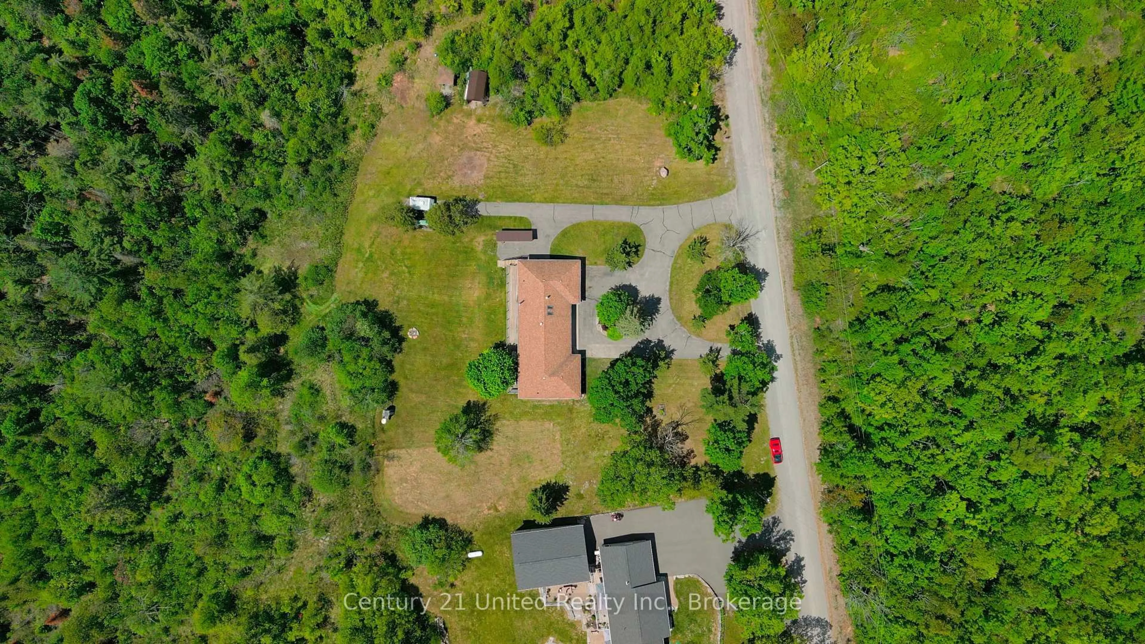 A pic from outside/outdoor area/front of a property/back of a property/a pic from drone, forest/trees view for 65 Laplantes Rd, Trent Lakes Ontario K0L 1J0