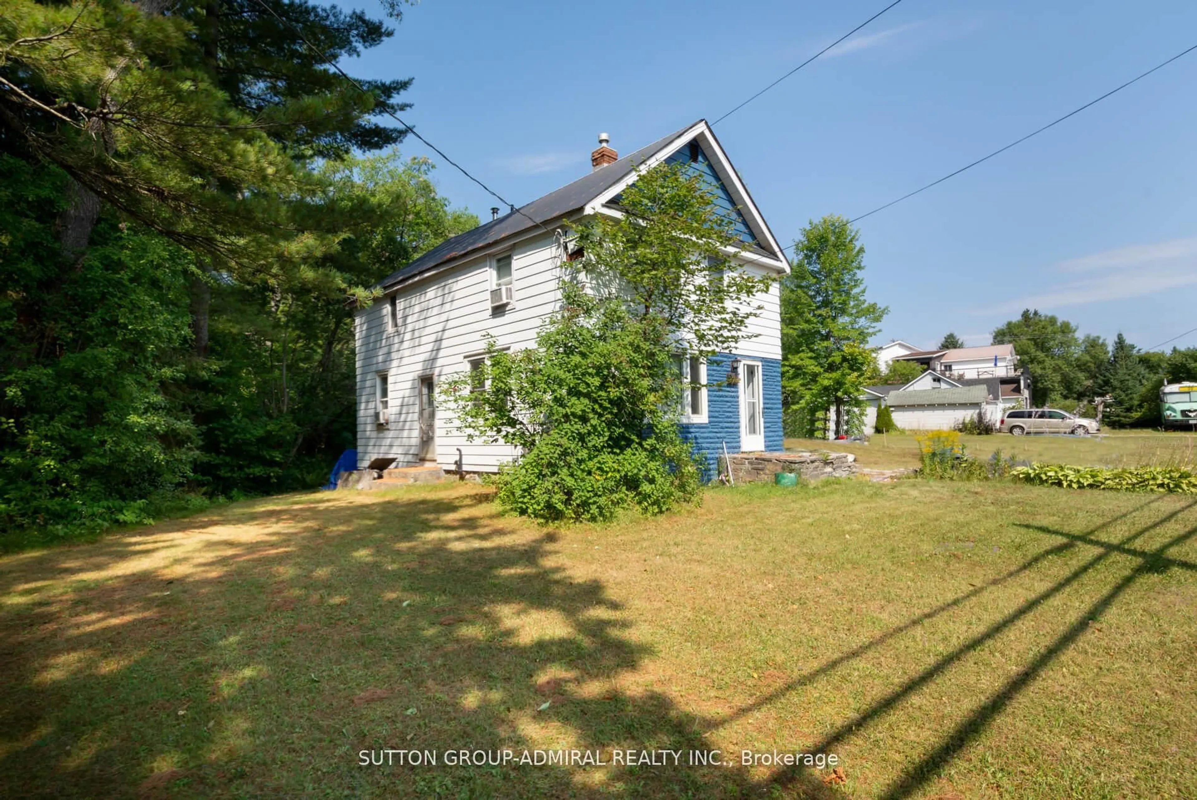 A pic from outside/outdoor area/front of a property/back of a property/a pic from drone, street for 536 Muskoka Road 3 N #3, Huntsville Ontario P1H 1C8