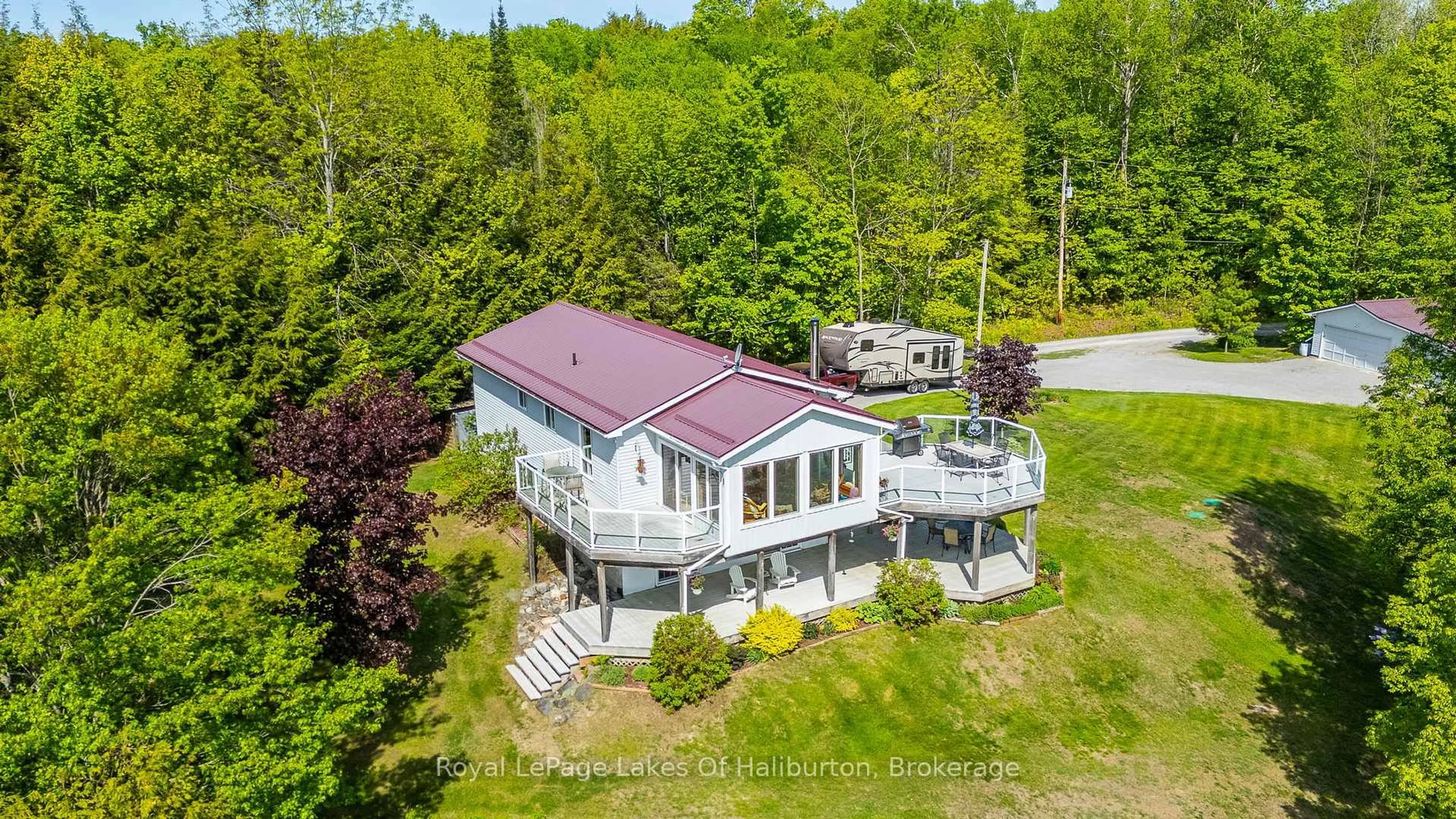 A pic from outside/outdoor area/front of a property/back of a property/a pic from drone, unknown for 1123 Balmoral Lane, Highlands East Ontario K0M 1R0