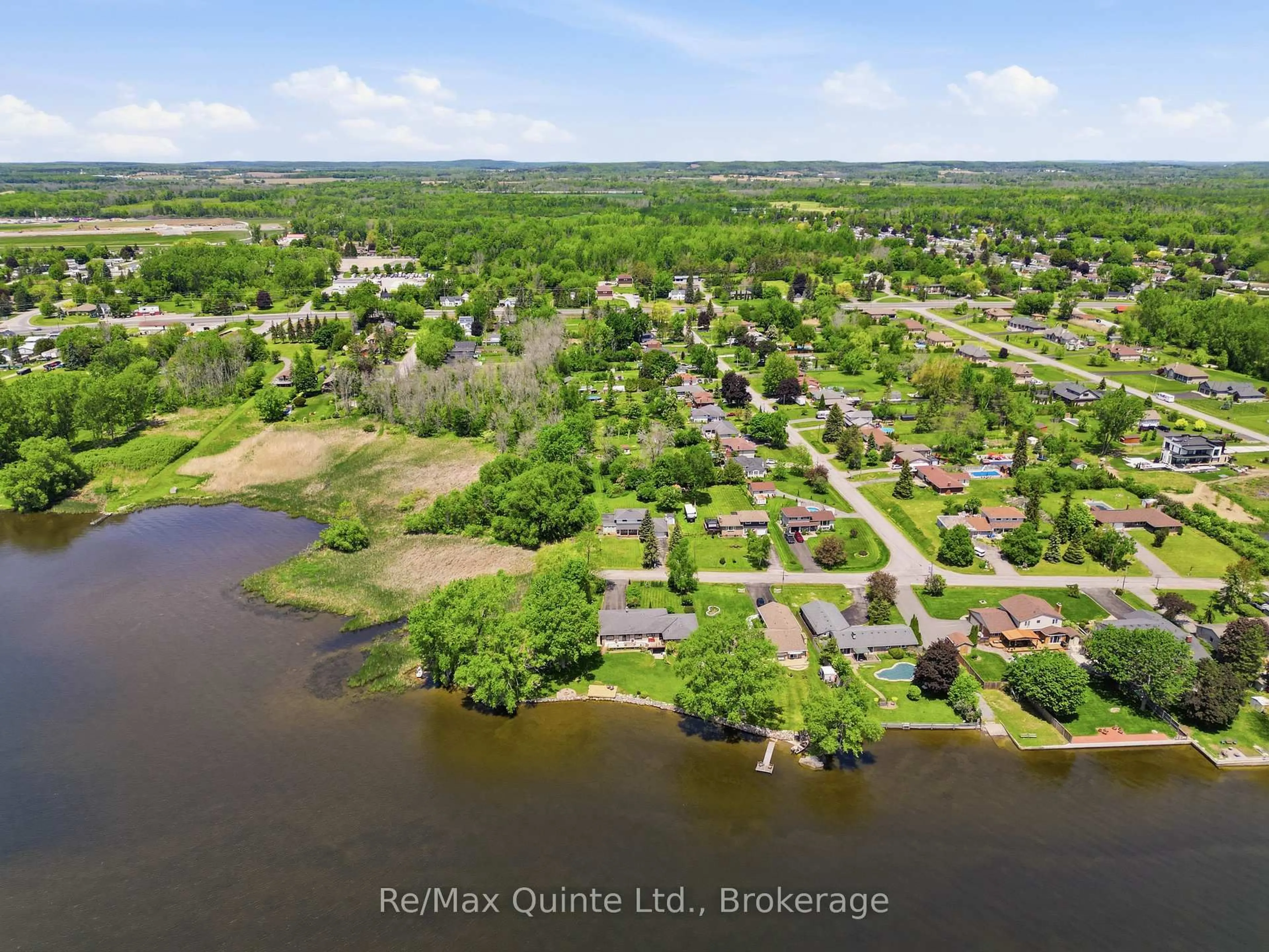 A pic from outside/outdoor area/front of a property/back of a property/a pic from drone, water/lake/river/ocean view for 106 Baylea Dr, Quinte West Ontario K8V 5P5
