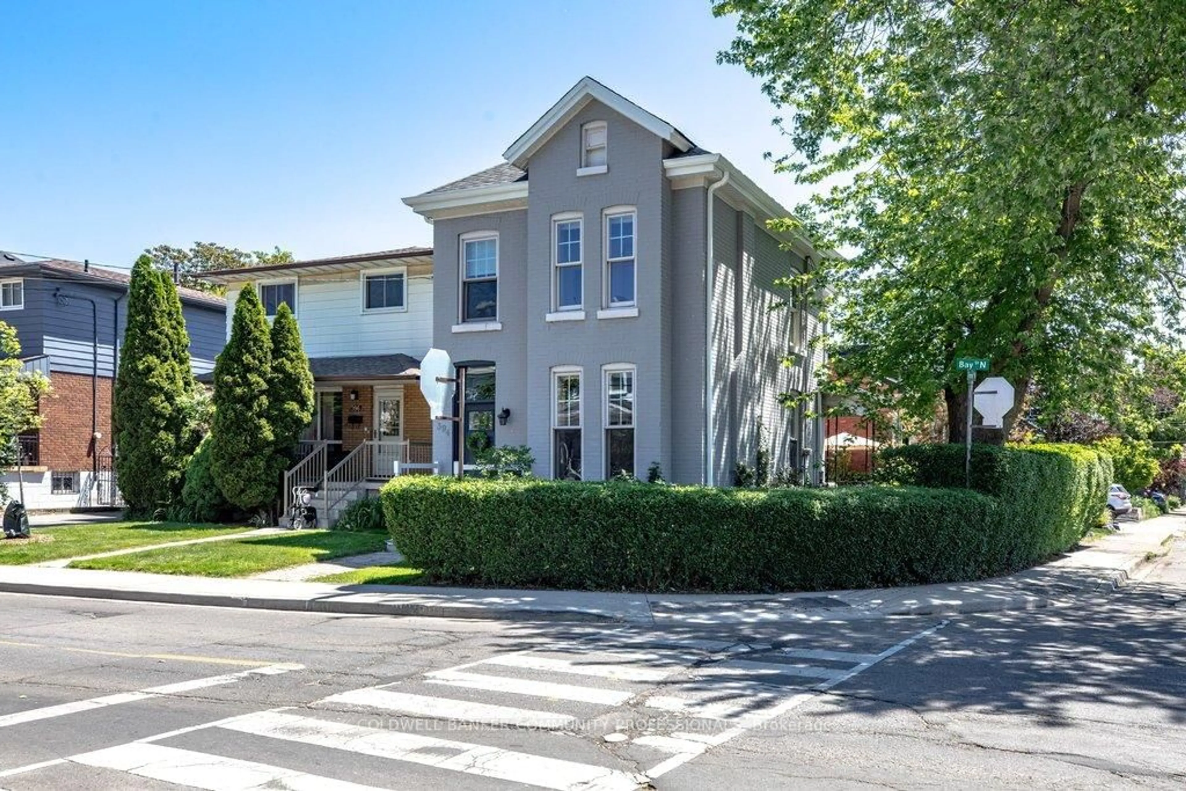 Home with brick exterior material, street for 394 Bay St, Hamilton Ontario L8L 1N1