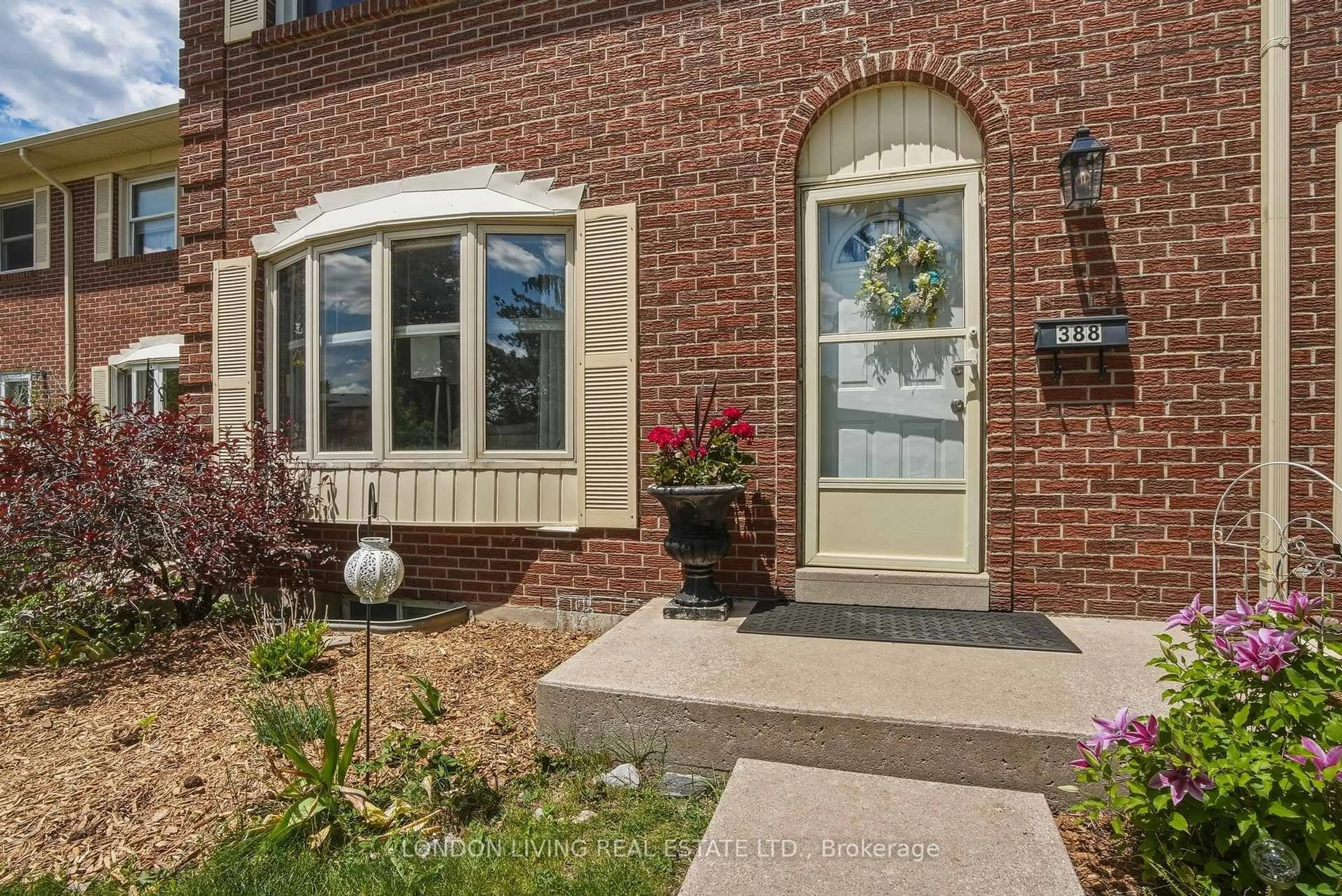 Home with brick exterior material, street for 388 Homestead Crt #36, London North Ontario N6G 2E9