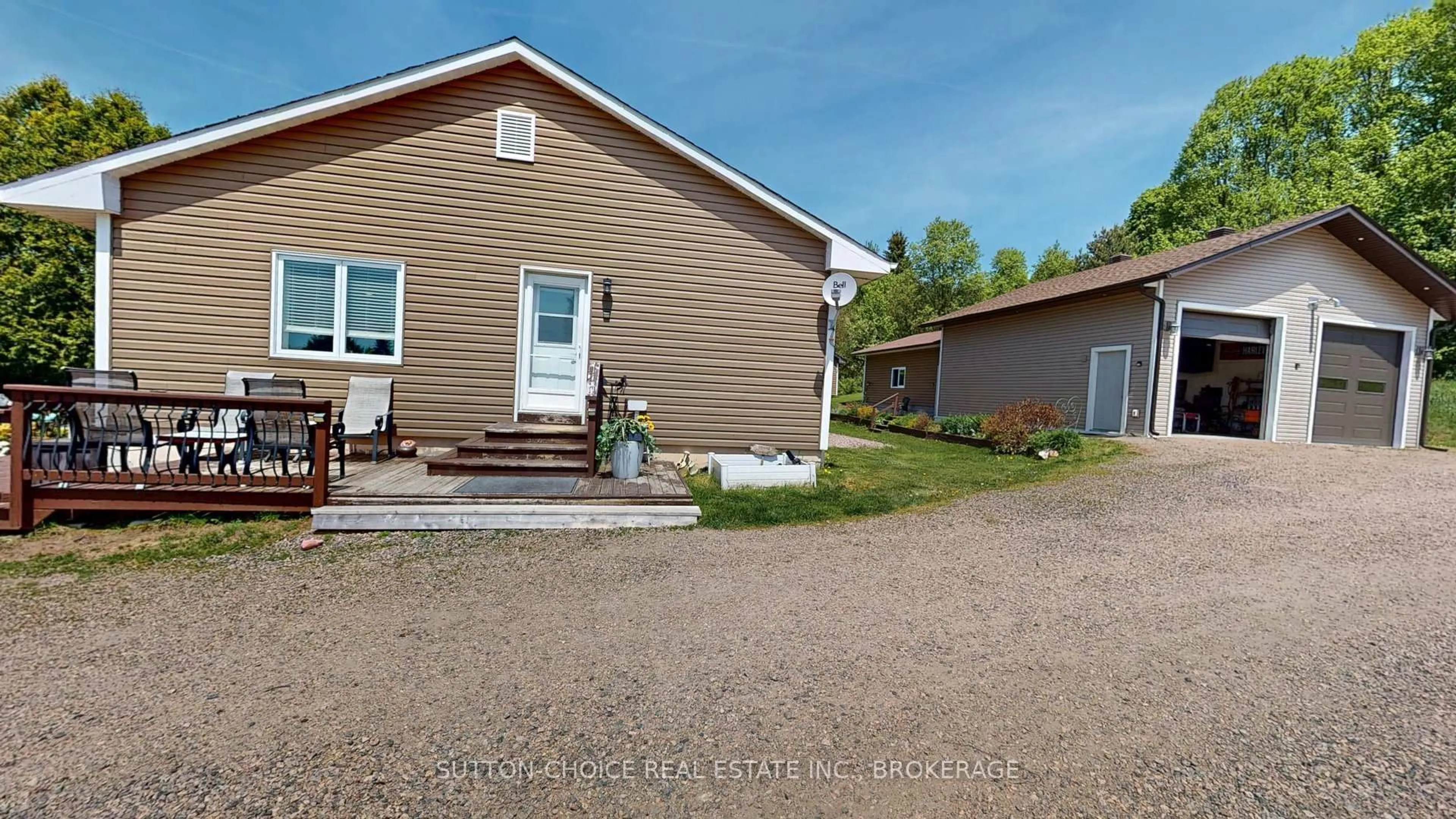 A pic from outside/outdoor area/front of a property/back of a property/a pic from drone, street for 222 Yonge St, Bonfield Ontario P0H 1E0