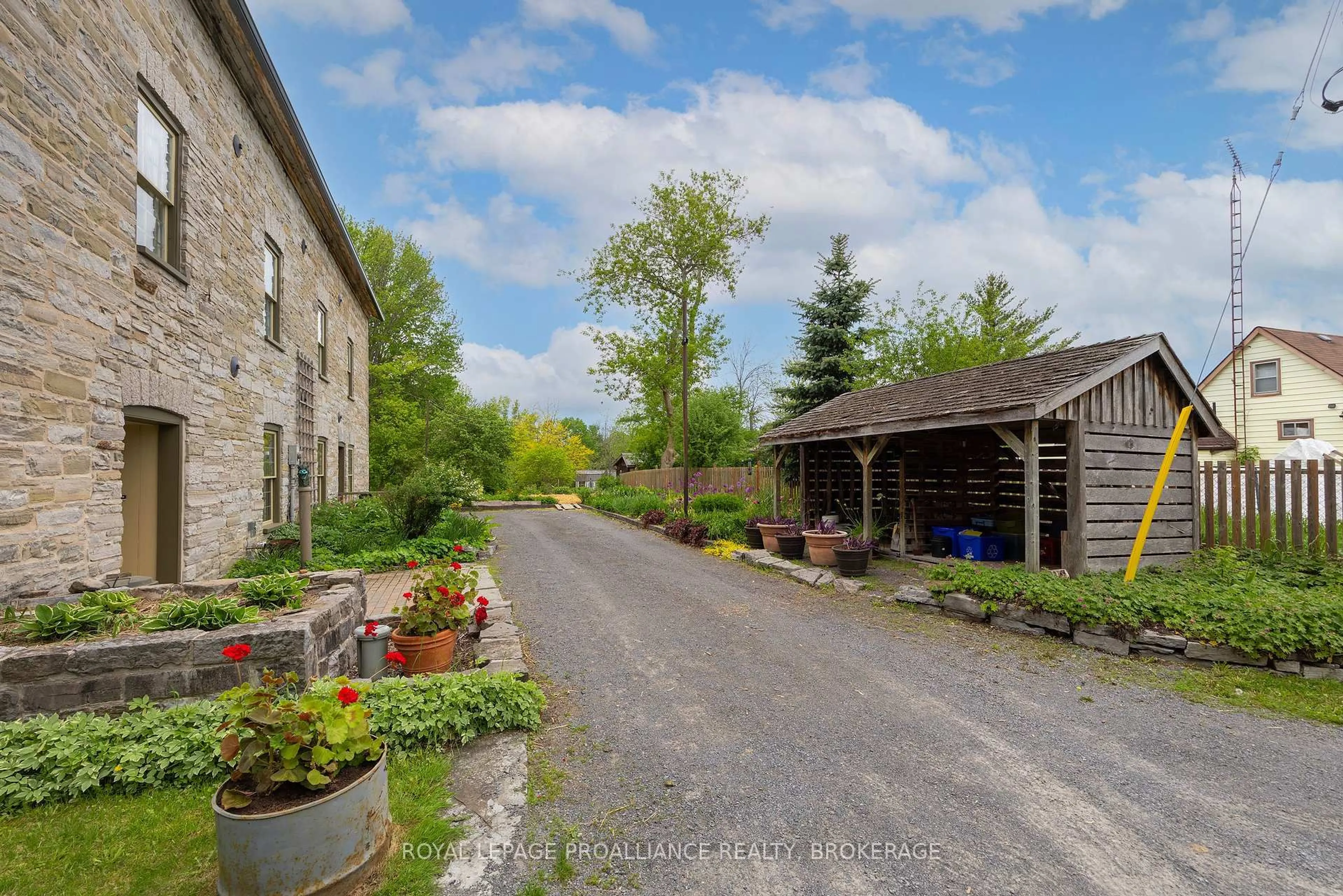 A pic from outside/outdoor area/front of a property/back of a property/a pic from drone, street for 28 Front St, Newburgh Ontario K0K 2S0