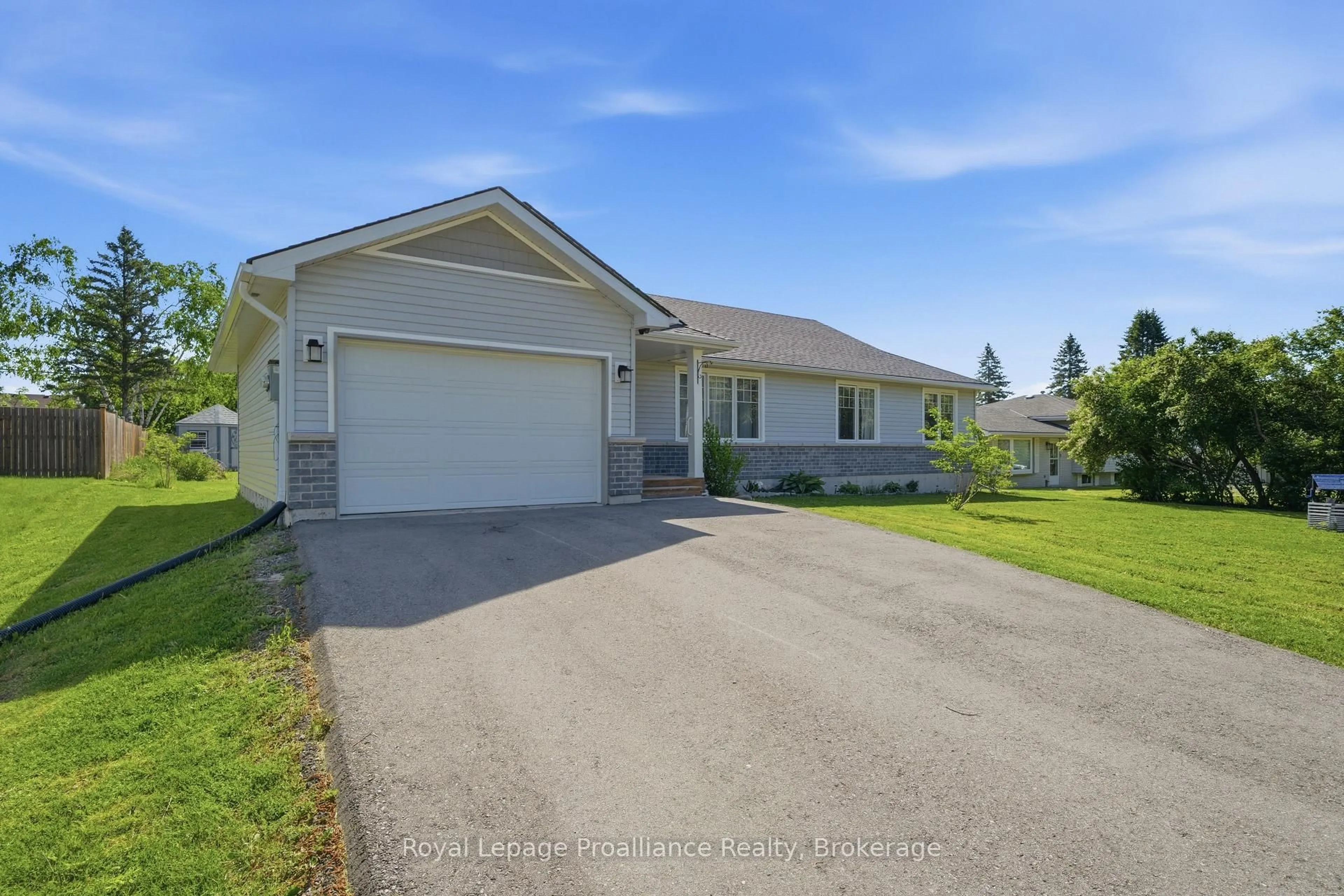 A pic from outside/outdoor area/front of a property/back of a property/a pic from drone, street for 568 Whites Rd, Trenton Ontario K8V 5P8