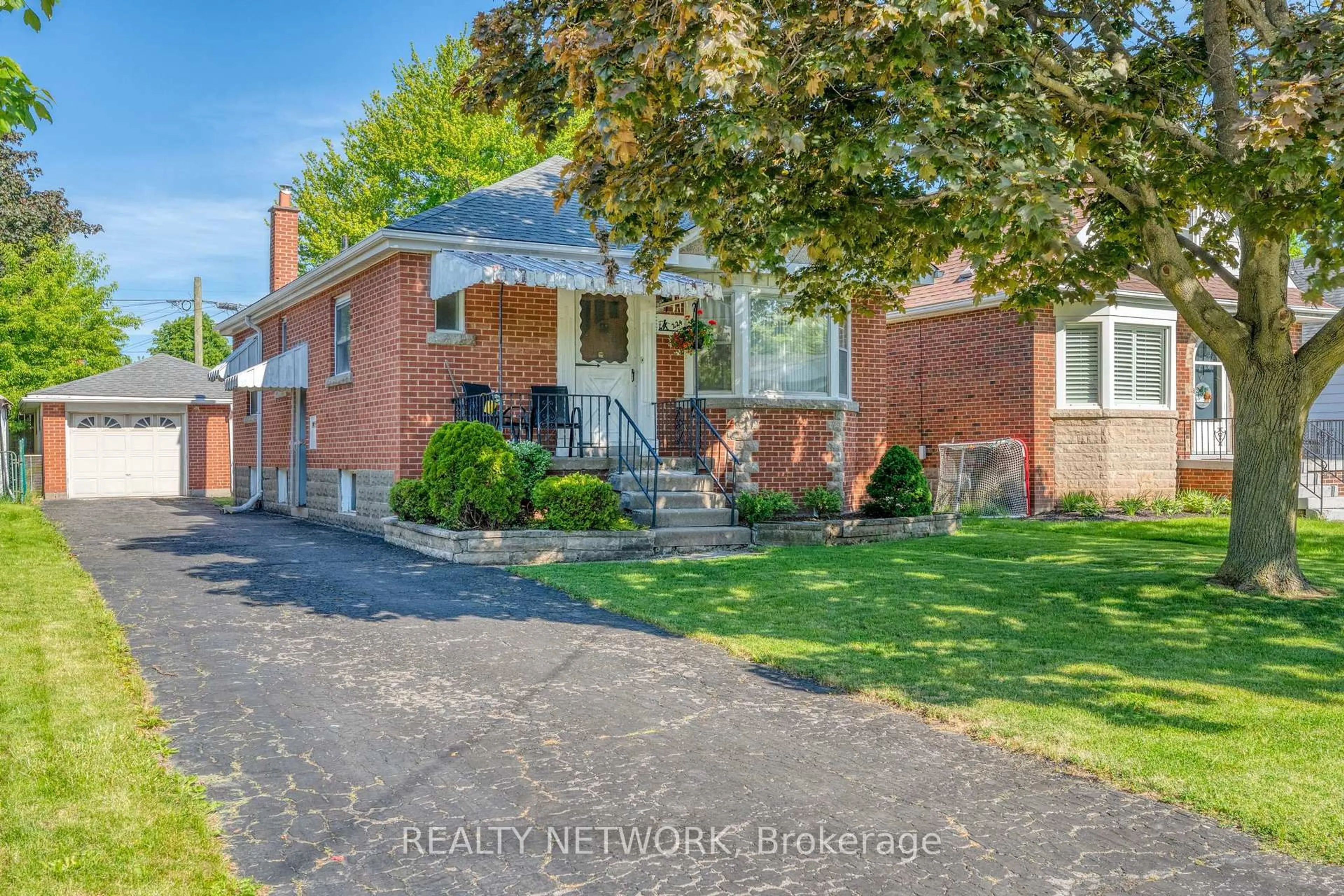 Home with brick exterior material, street for 224 Glencarry Ave, Hamilton Ontario L8K 3R9