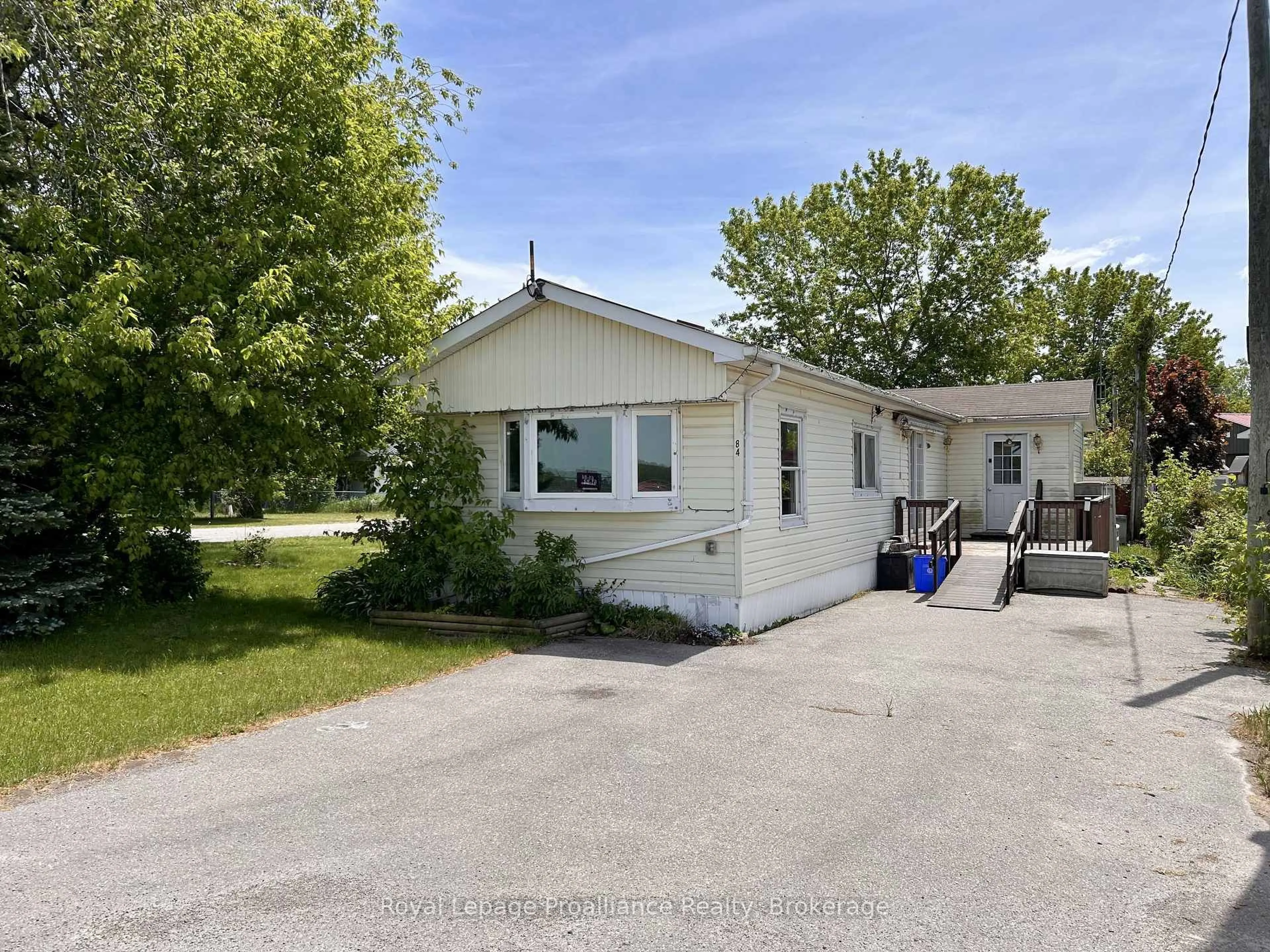A pic from outside/outdoor area/front of a property/back of a property/a pic from drone, street for 63 Whites Rd #84, Quinte West Ontario K8V 5P5