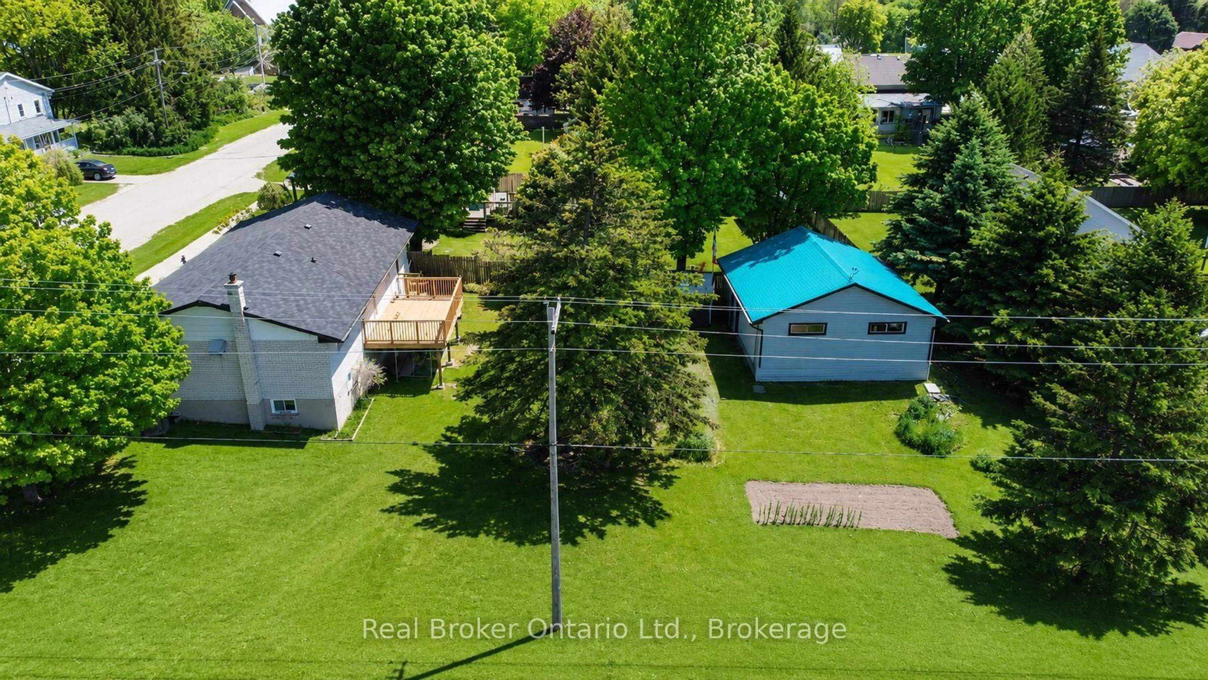 A pic from outside/outdoor area/front of a property/back of a property/a pic from drone, street for 815 Albert St, West Grey Ontario N0G 1C0