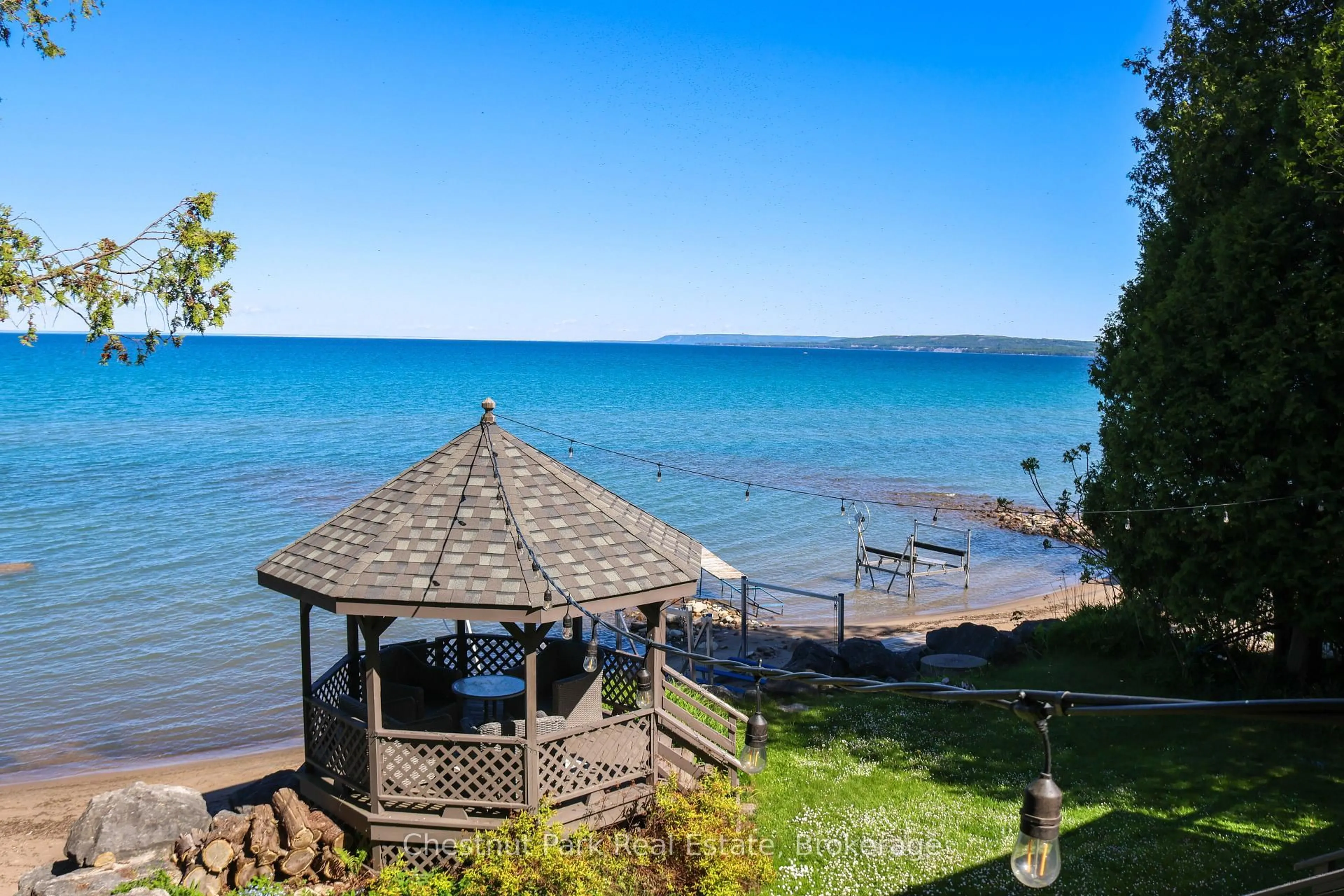 A pic from outside/outdoor area/front of a property/back of a property/a pic from drone, water/lake/river/ocean view for 225 Cedar Ave, Meaford Ontario N4L 1W5