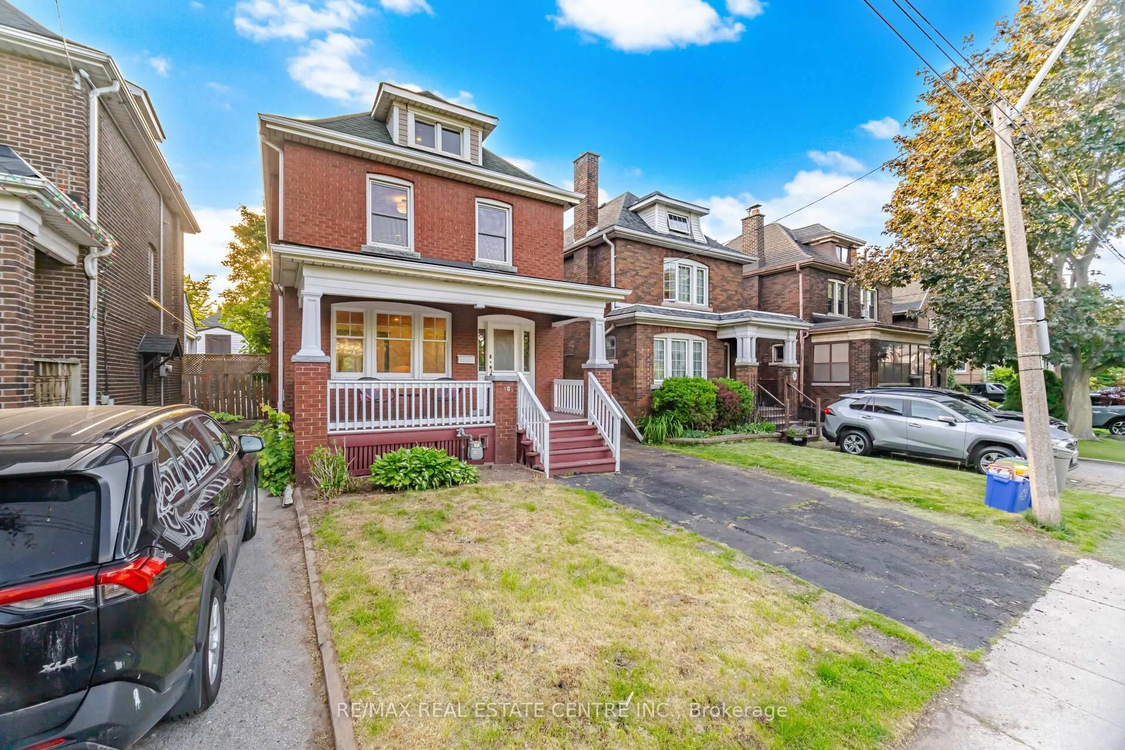 Home with brick exterior material, street for 90 Holton Ave, Hamilton Ontario L8M 2L2