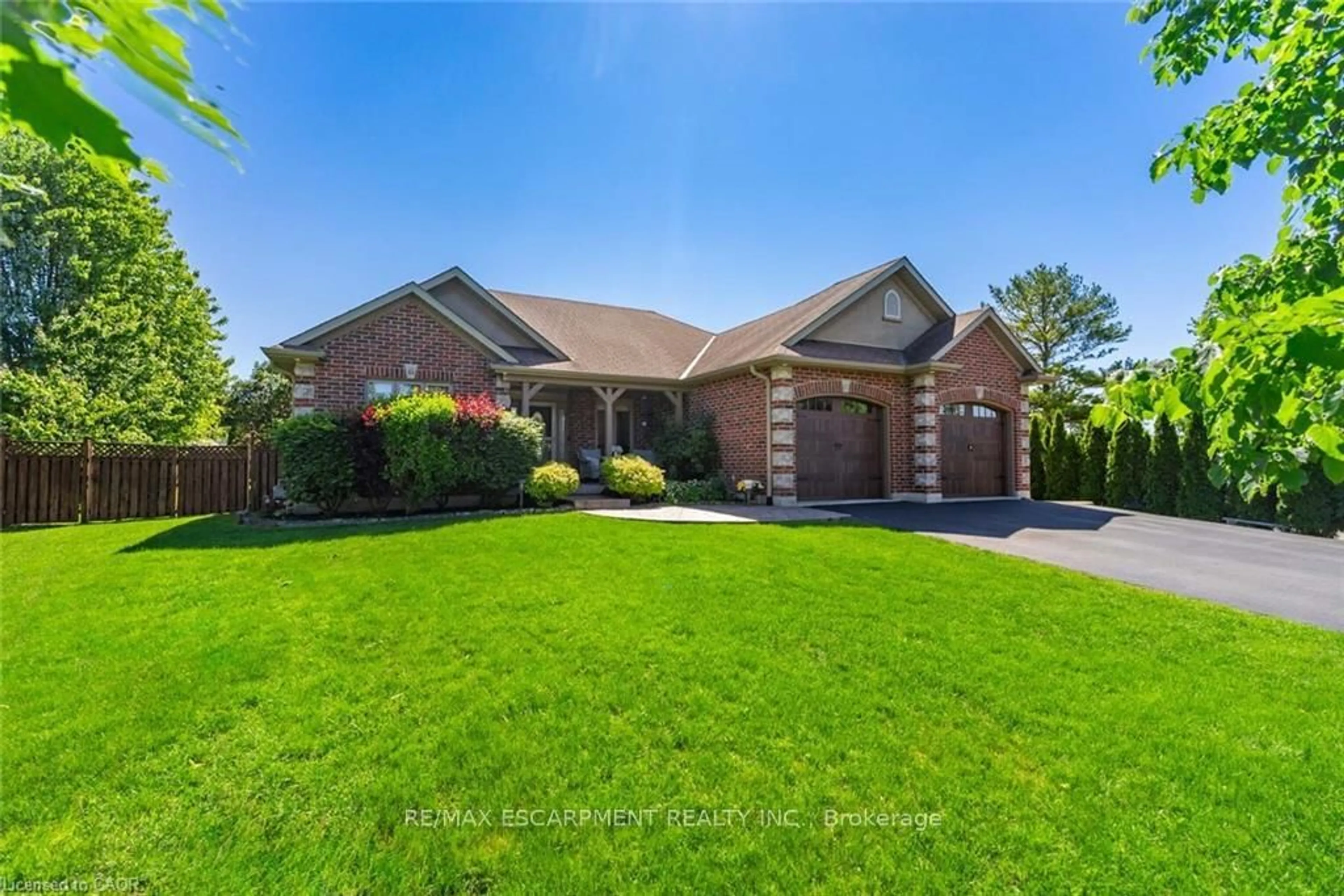 Home with brick exterior material, street for 46 Sea Breeze Dr, Norfolk Ontario N0A 1N7