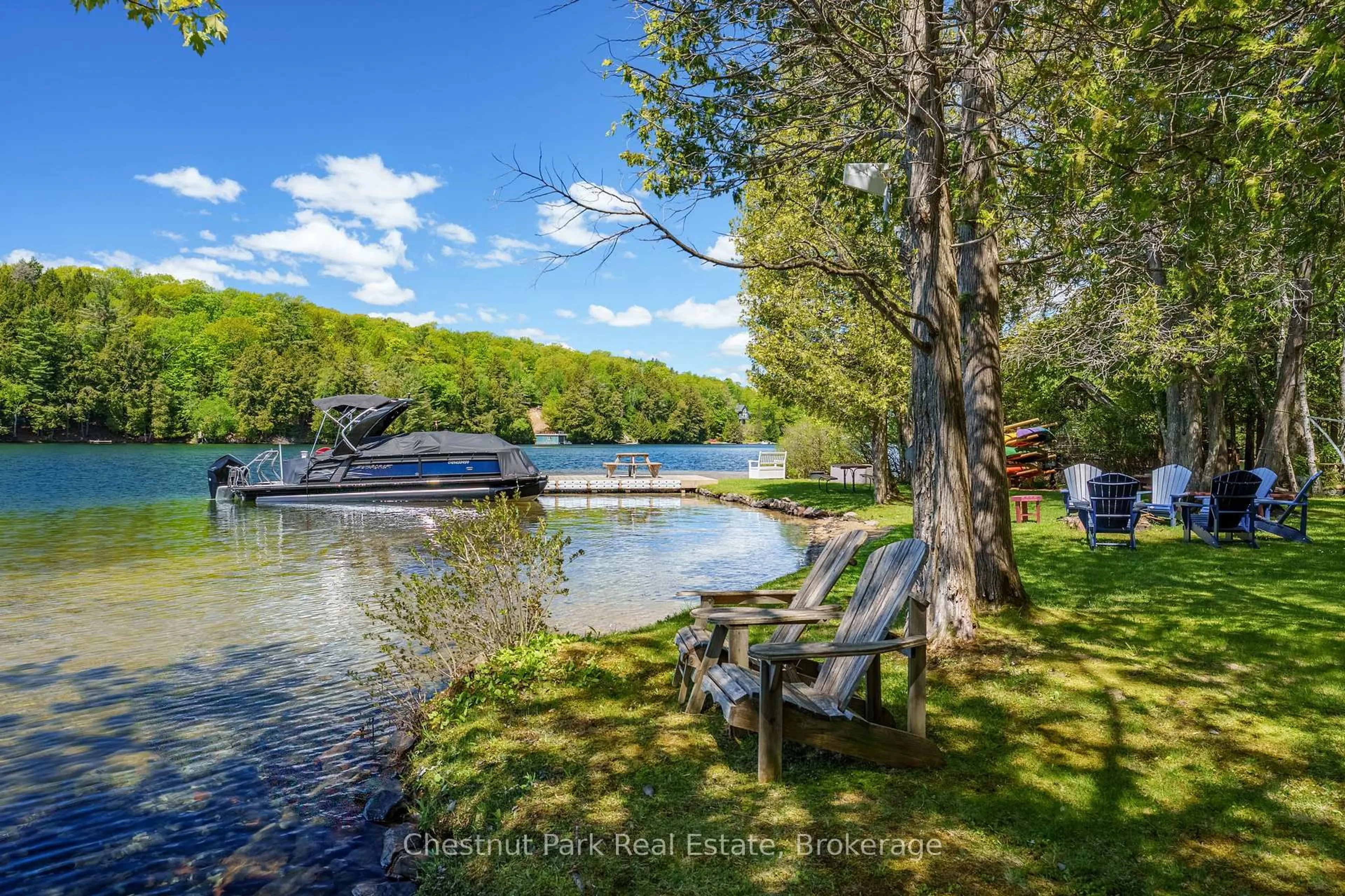 A pic from outside/outdoor area/front of a property/back of a property/a pic from drone, water/lake/river/ocean view for 23 Beaumont Bay Rd, Muskoka Lakes Ontario P0B 1M0