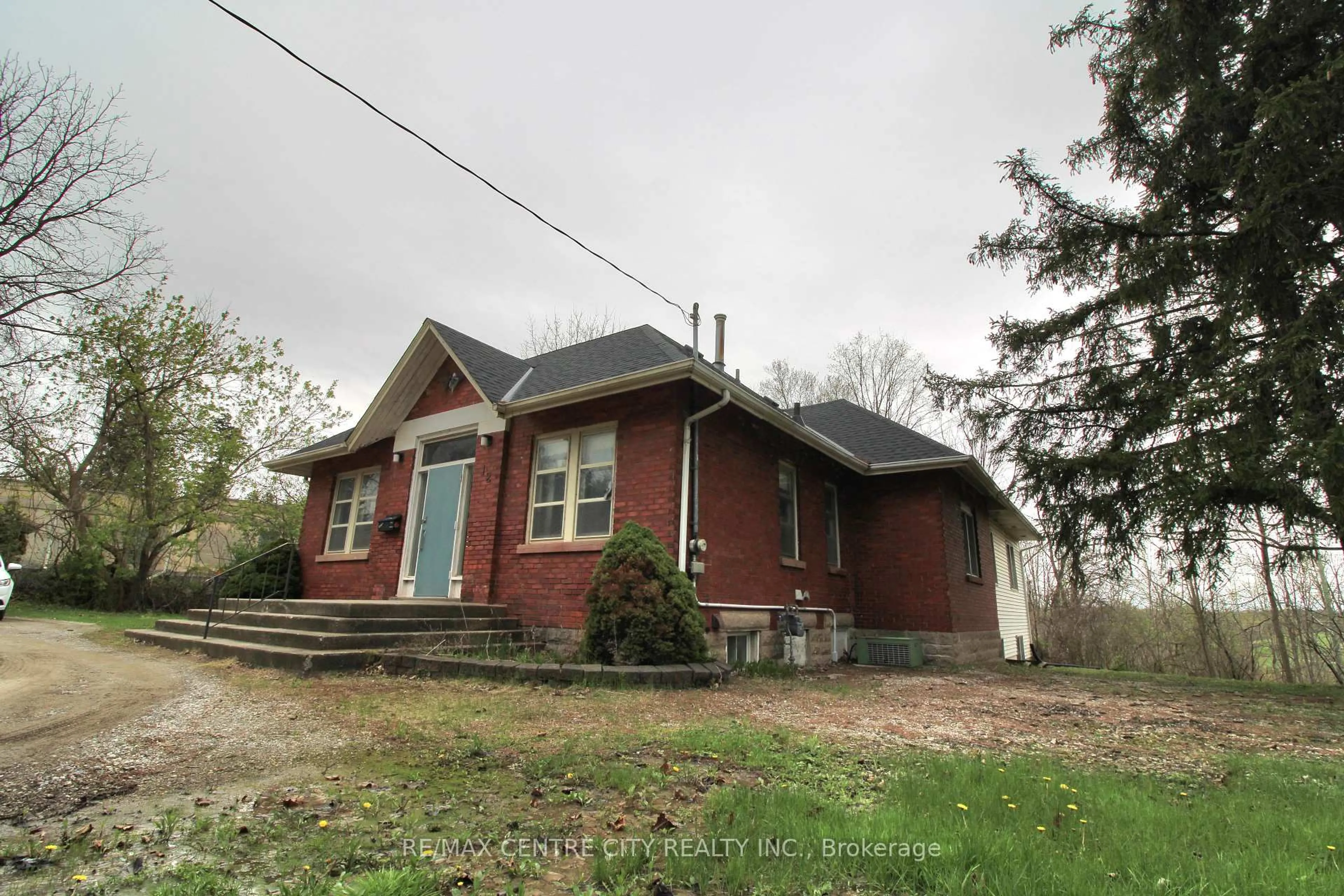 Home with brick exterior material, building for 12 Chester St, St. Thomas Ontario N5R 1T8