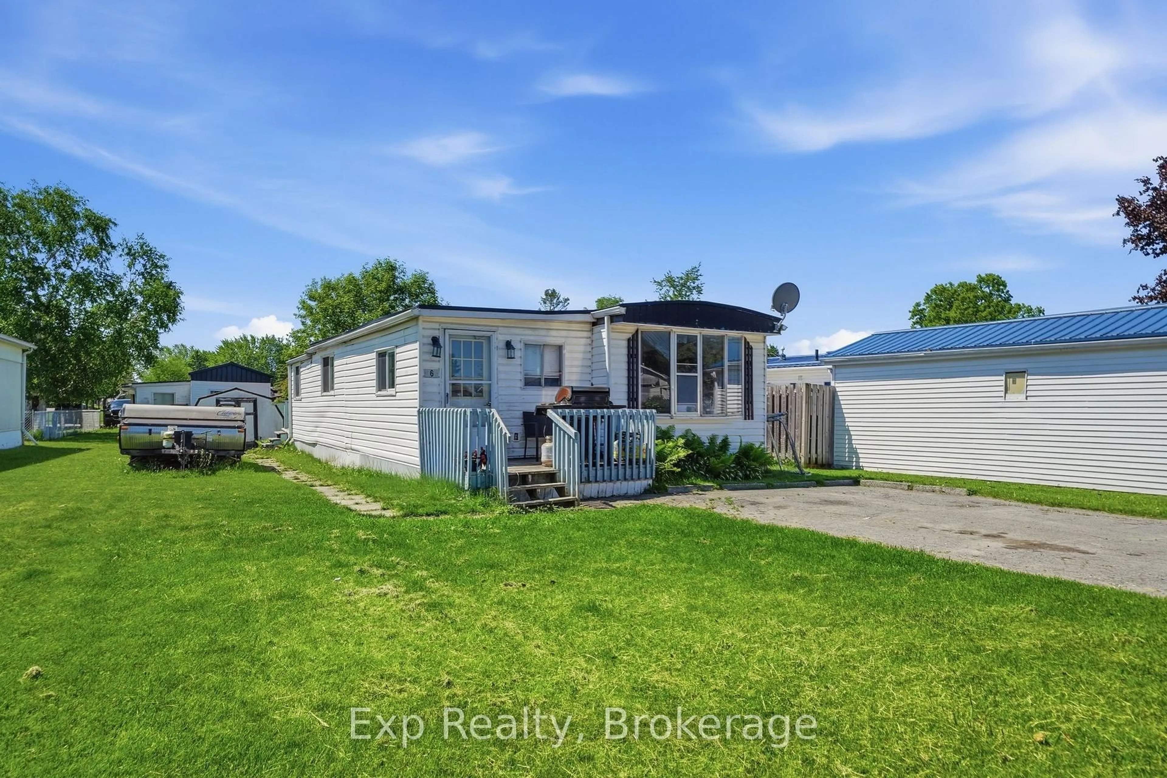 A pic from outside/outdoor area/front of a property/back of a property/a pic from drone, water/lake/river/ocean view for 6 Juniper Lane, Belleville Ontario K8N 4Z3