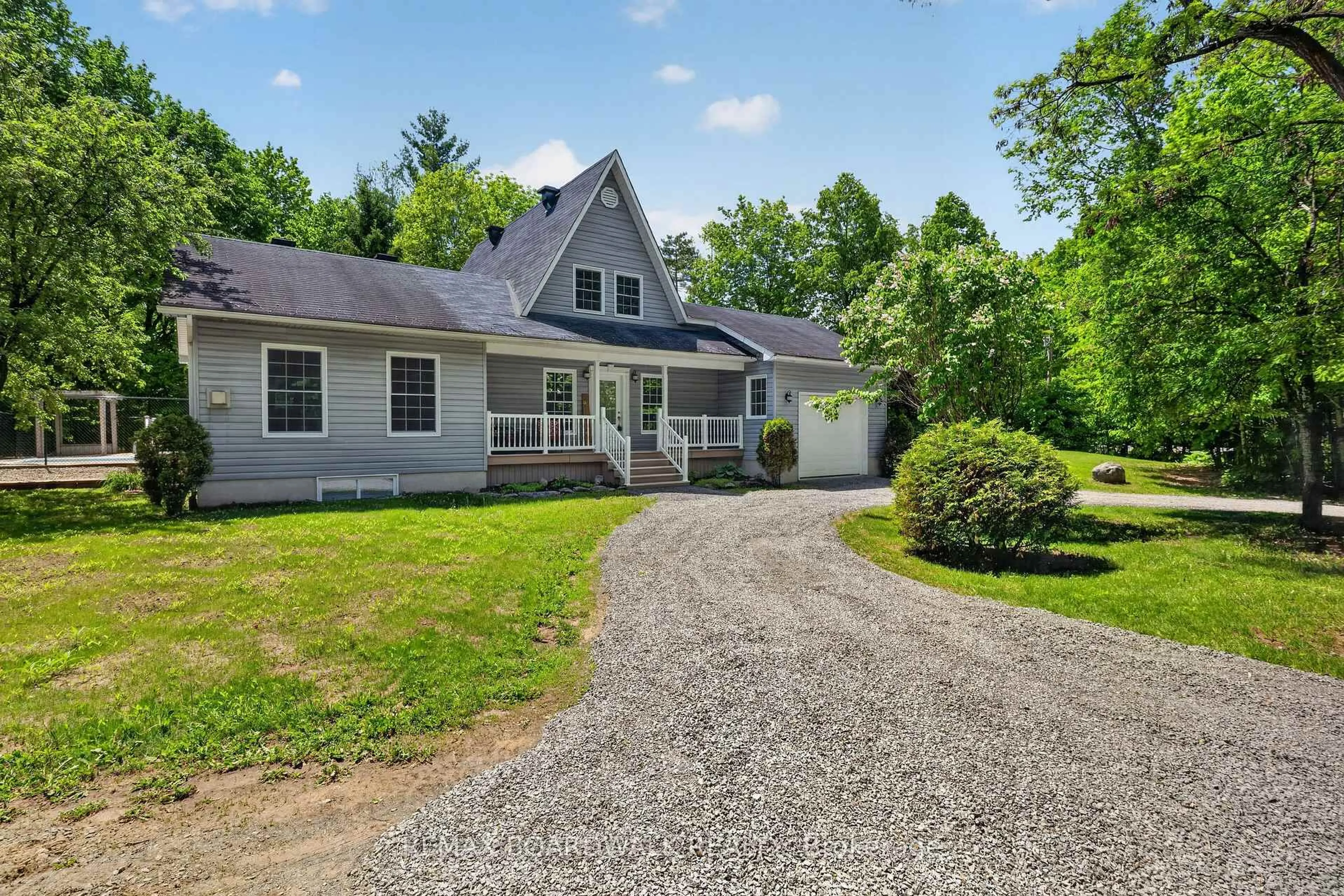 A pic from outside/outdoor area/front of a property/back of a property/a pic from drone, street for 14930 Concession 10-11 Rd, North Stormont Ontario K0A 1R0