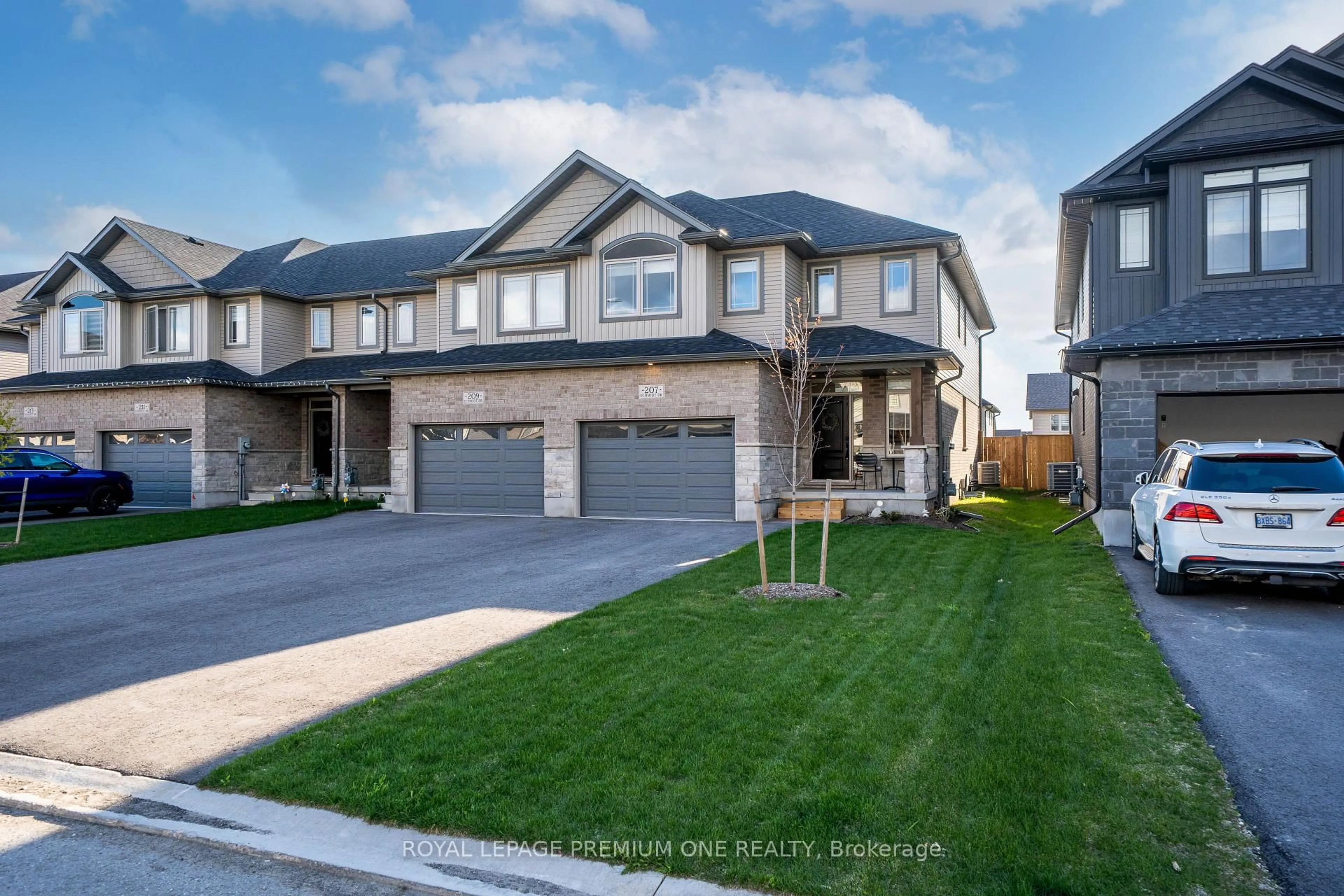 Home with brick exterior material, street for 207 Schmidt Dr, Wellington North Ontario N0G 1A0