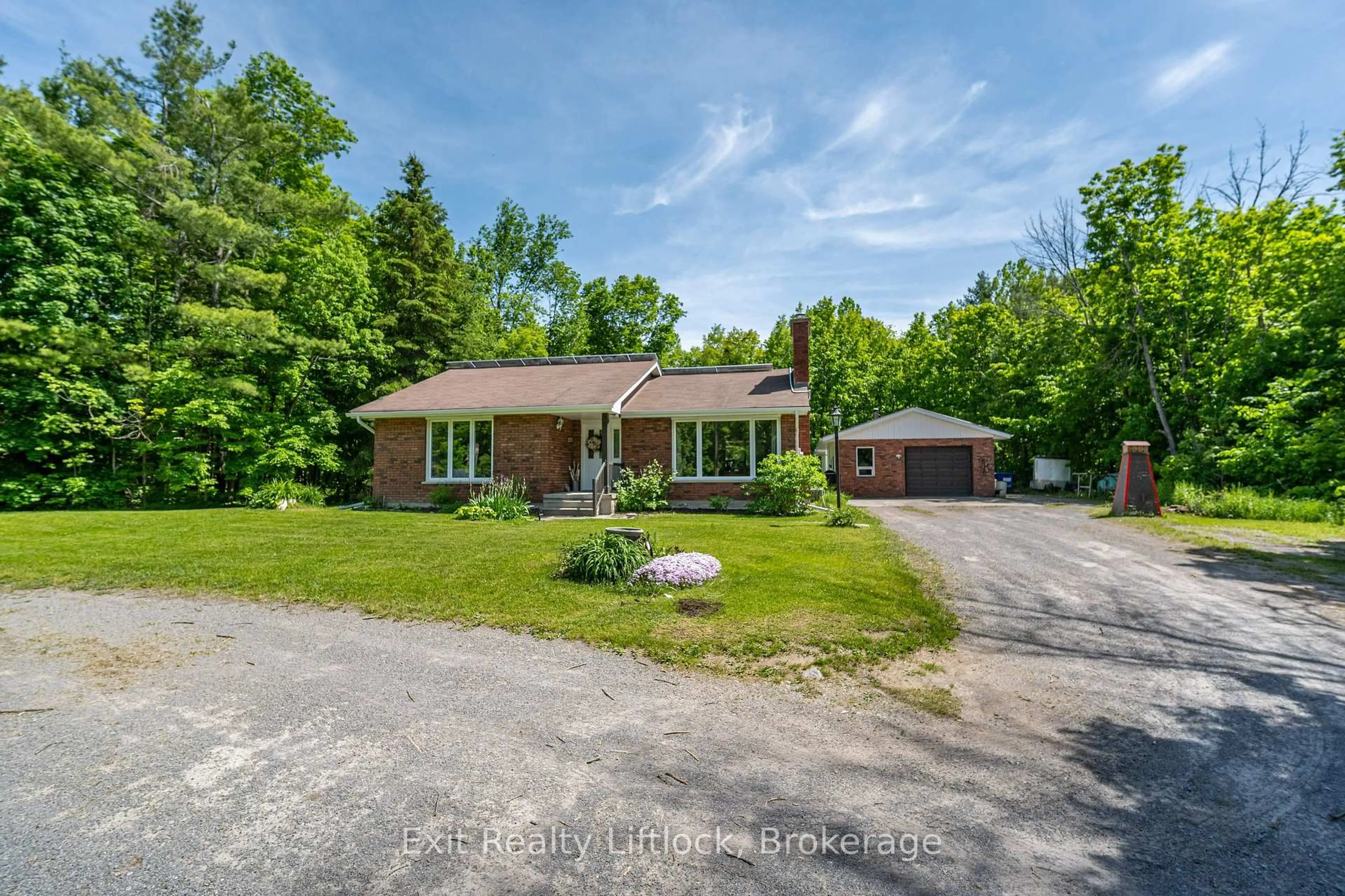 A pic from outside/outdoor area/front of a property/back of a property/a pic from drone, street for 645 Birchview Rd, Douro-Dummer Ontario K0L 2H0