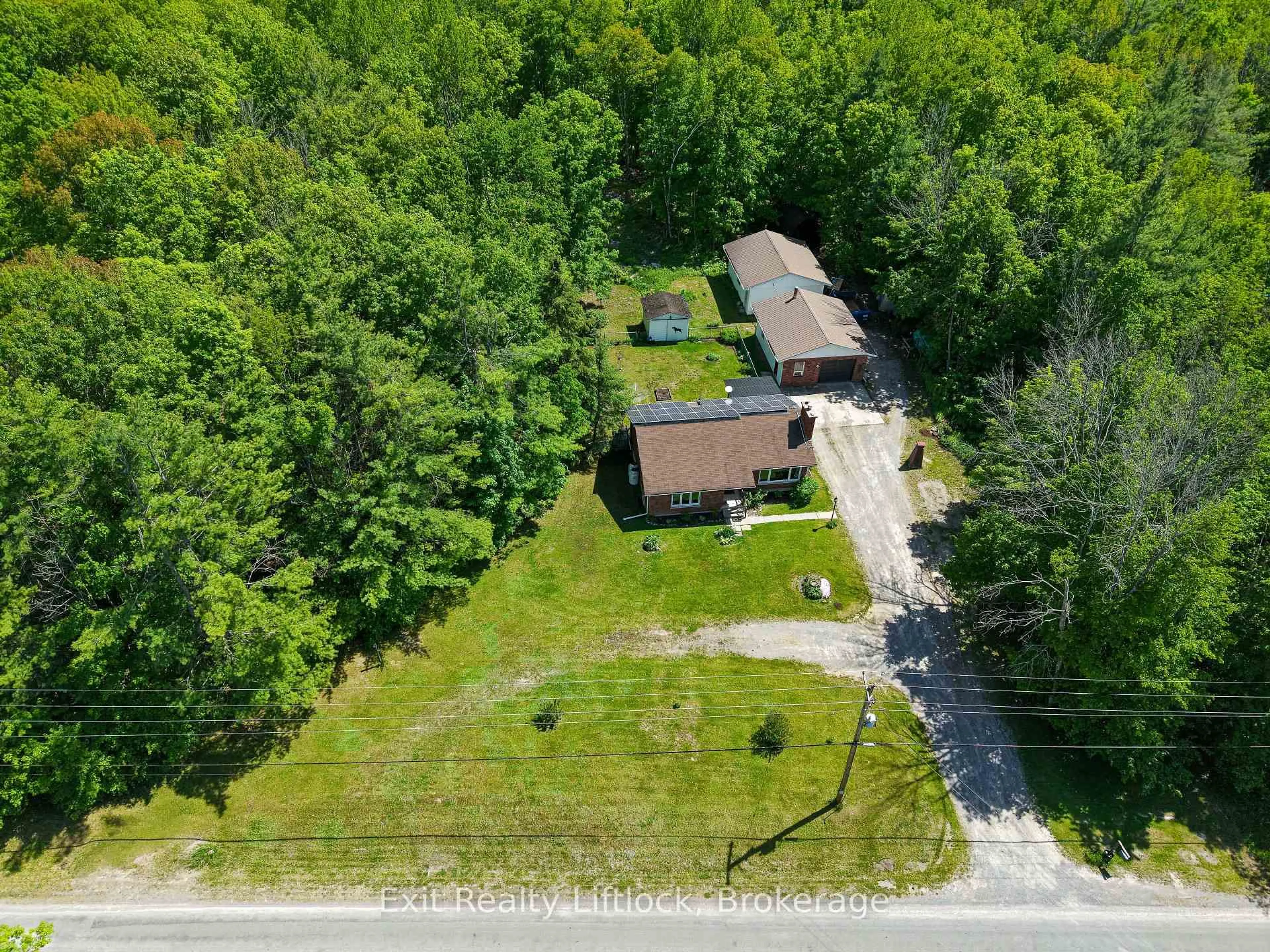 A pic from outside/outdoor area/front of a property/back of a property/a pic from drone, unknown for 645 Birchview Rd, Douro-Dummer Ontario K0L 2H0