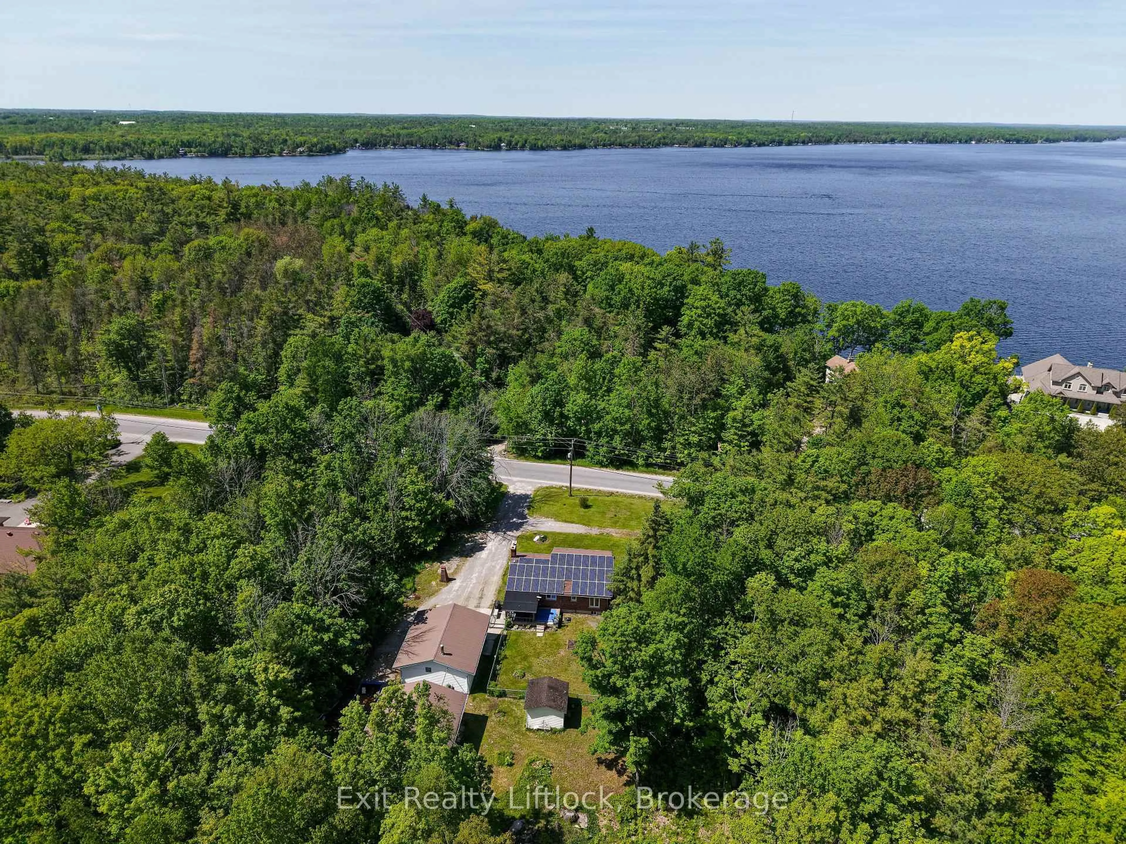 A pic from outside/outdoor area/front of a property/back of a property/a pic from drone, water/lake/river/ocean view for 645 Birchview Rd, Douro-Dummer Ontario K0L 2H0