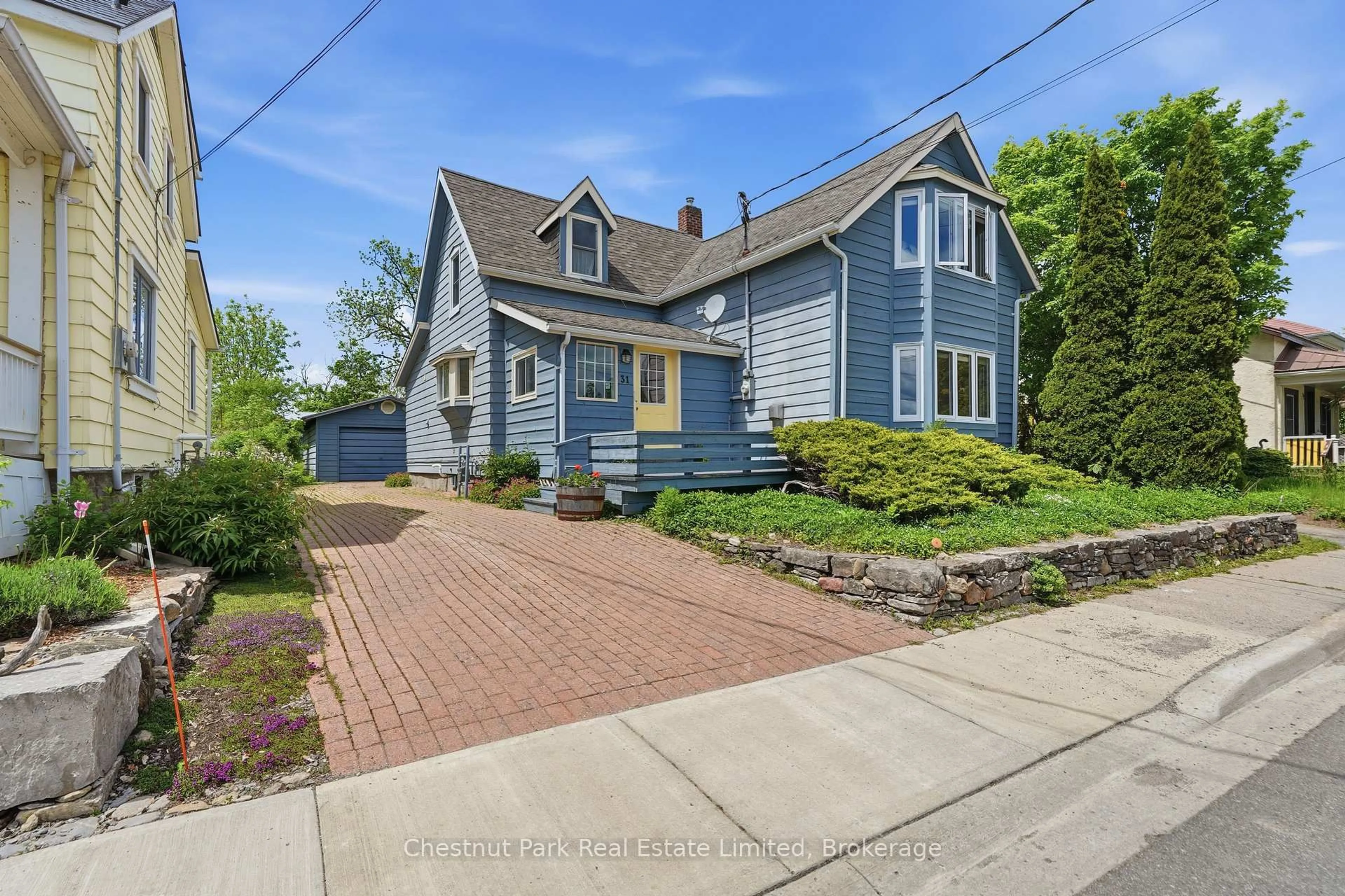 A pic from outside/outdoor area/front of a property/back of a property/a pic from drone, street for 31 Hill St, Prince Edward County Ontario K0K 2T0
