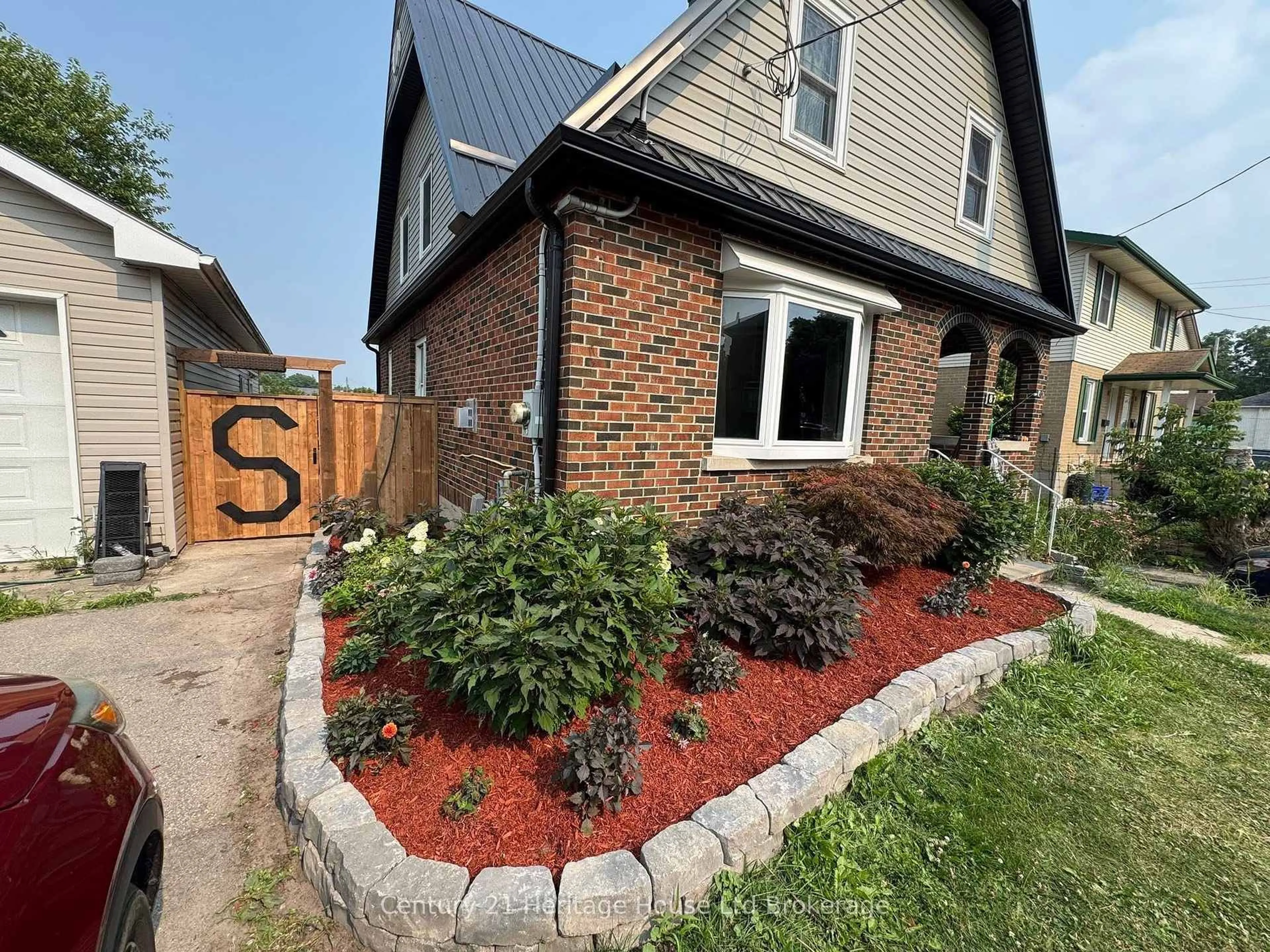 Home with brick exterior material, street for 87 Bay St, Woodstock Ontario N4S 3K7