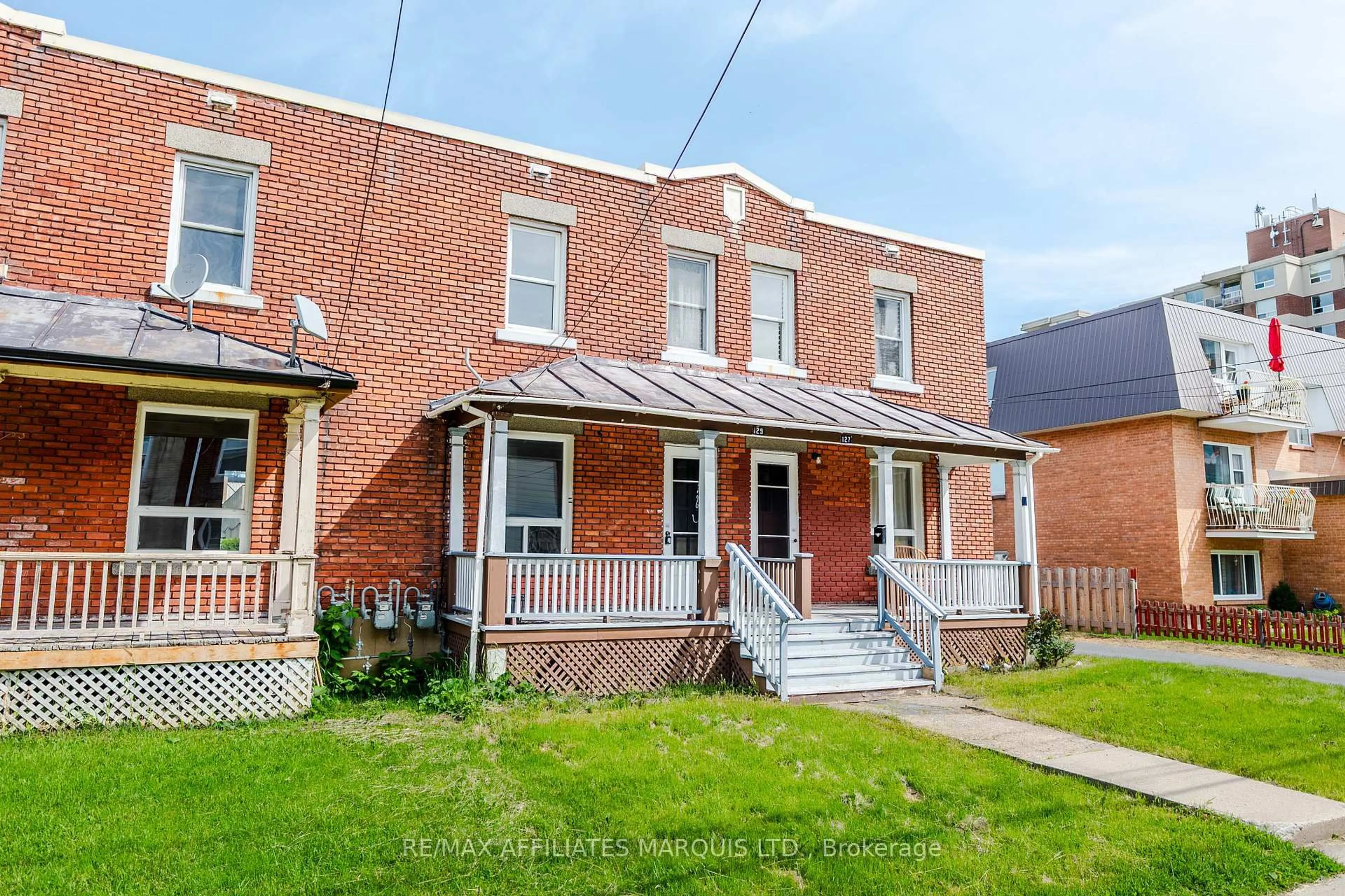 Home with brick exterior material, street for 129 First St, Cornwall Ontario K6J 1C2