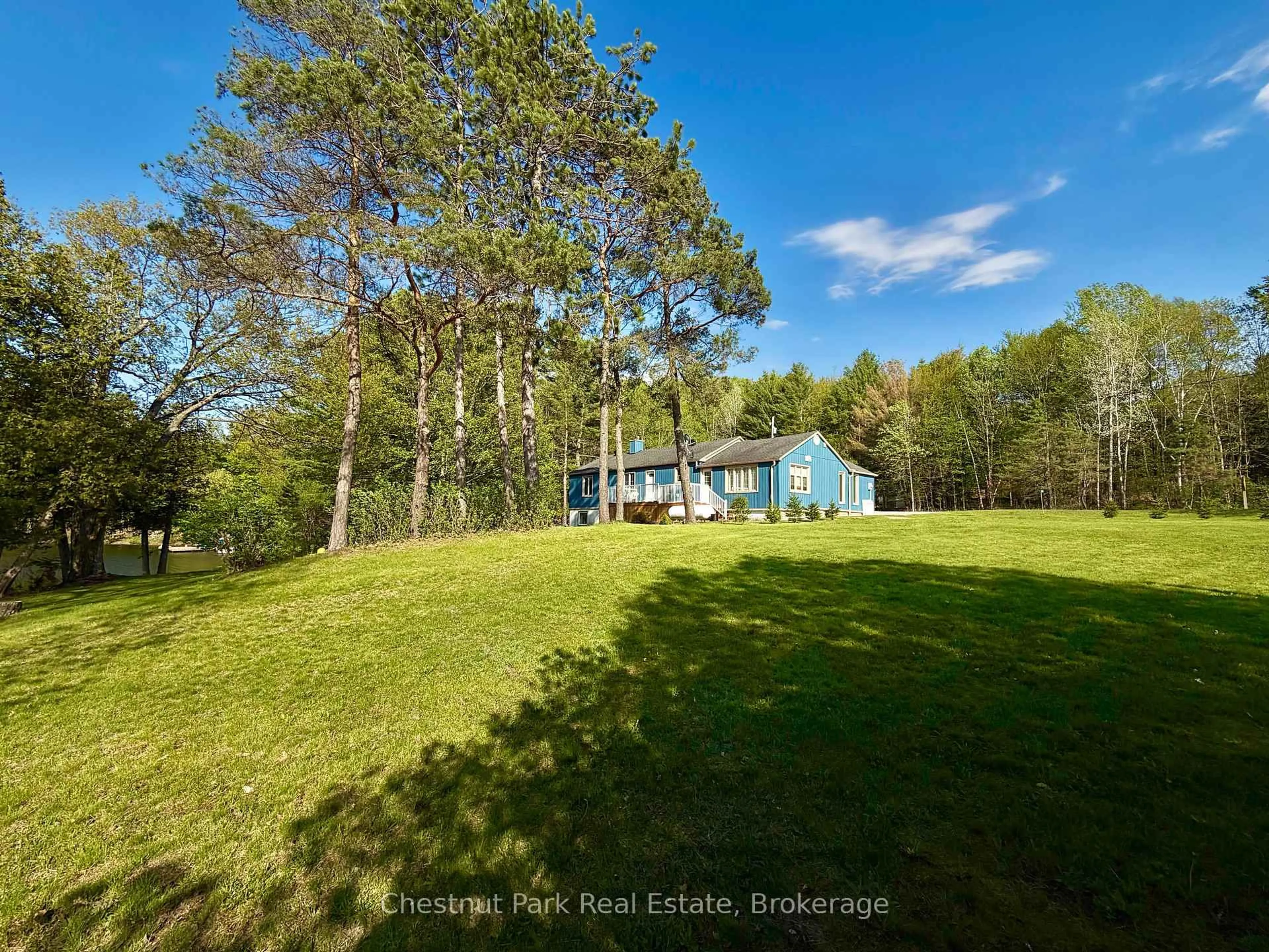 A pic from outside/outdoor area/front of a property/back of a property/a pic from drone, water/lake/river/ocean view for 9211 118 Highway, Minden Hills Ontario K0M 1S0