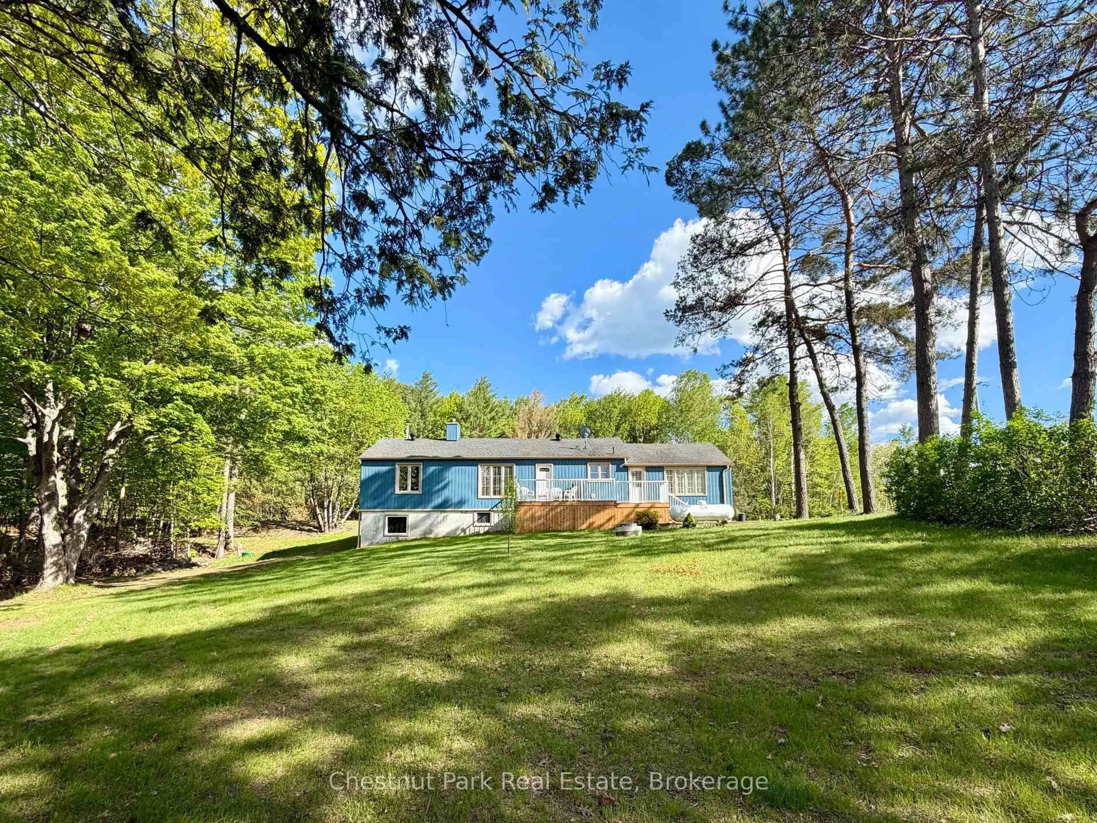 A pic from outside/outdoor area/front of a property/back of a property/a pic from drone, water/lake/river/ocean view for 9211 118 Highway, Minden Hills Ontario K0M 1S0