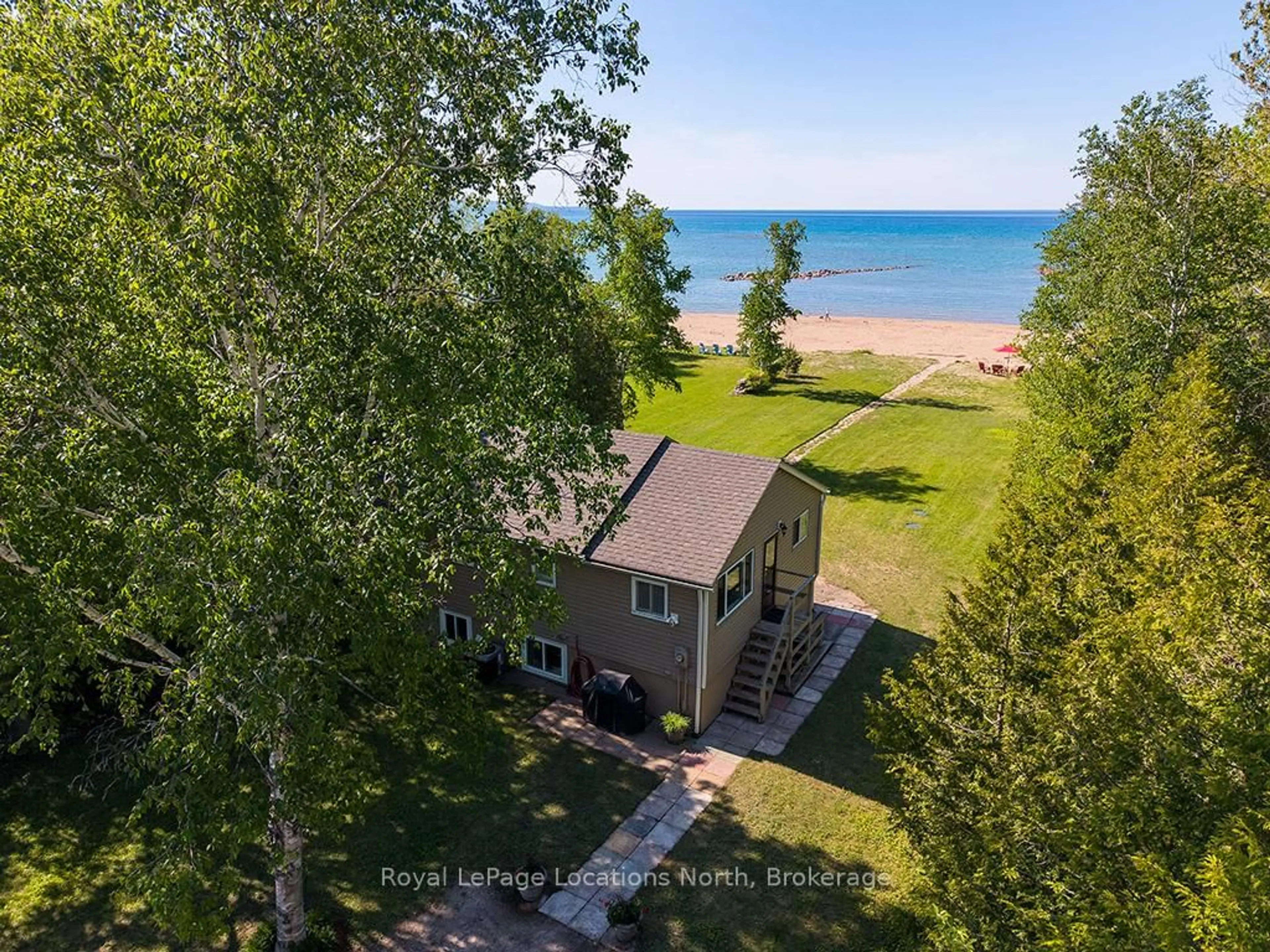 A pic from outside/outdoor area/front of a property/back of a property/a pic from drone, water/lake/river/ocean view for 111 Fraser St, Meaford Ontario N4L 1A1