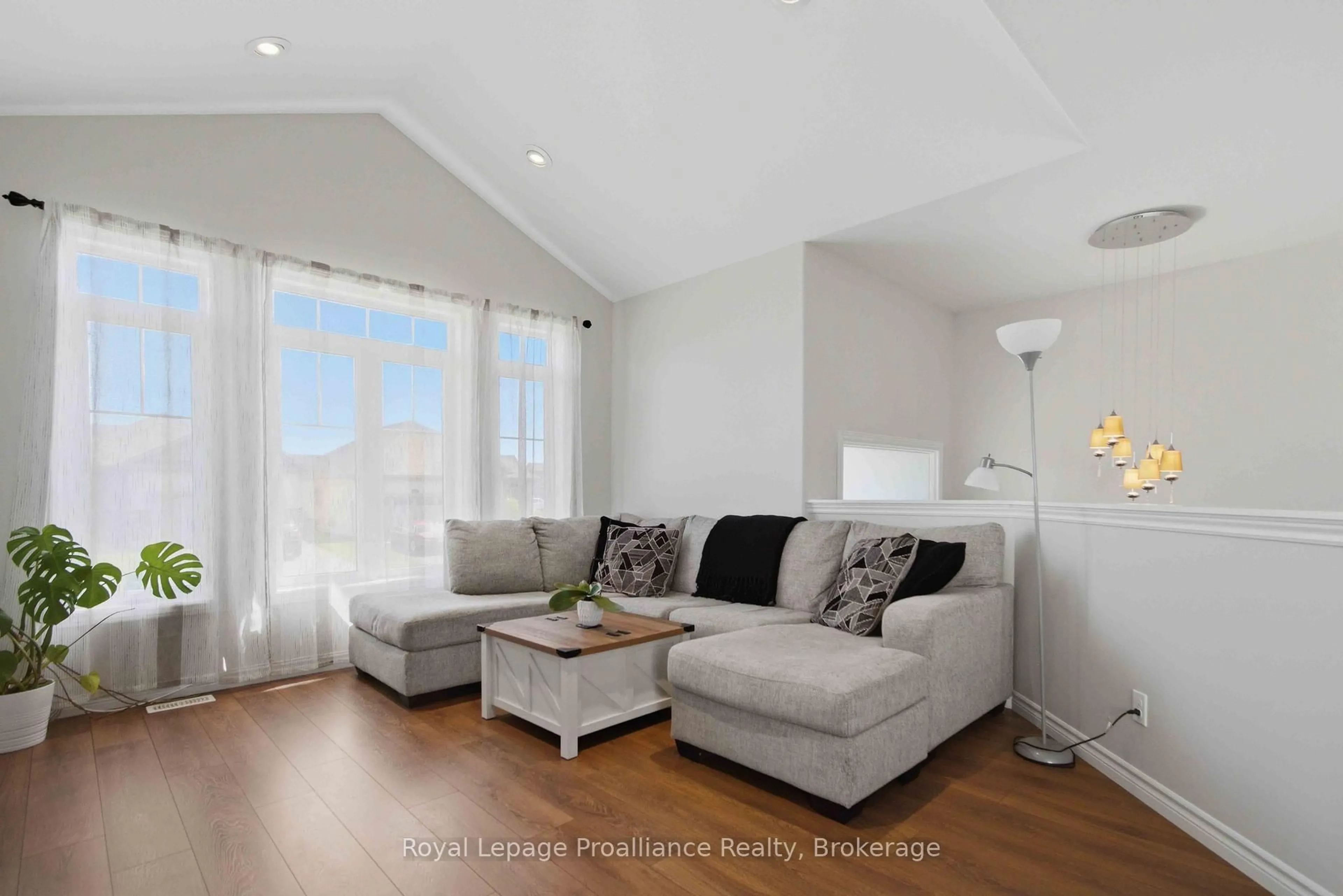 Living room with furniture, wood/laminate floor for 5 Walnut Dr, Belleville Ontario K8N 0E3