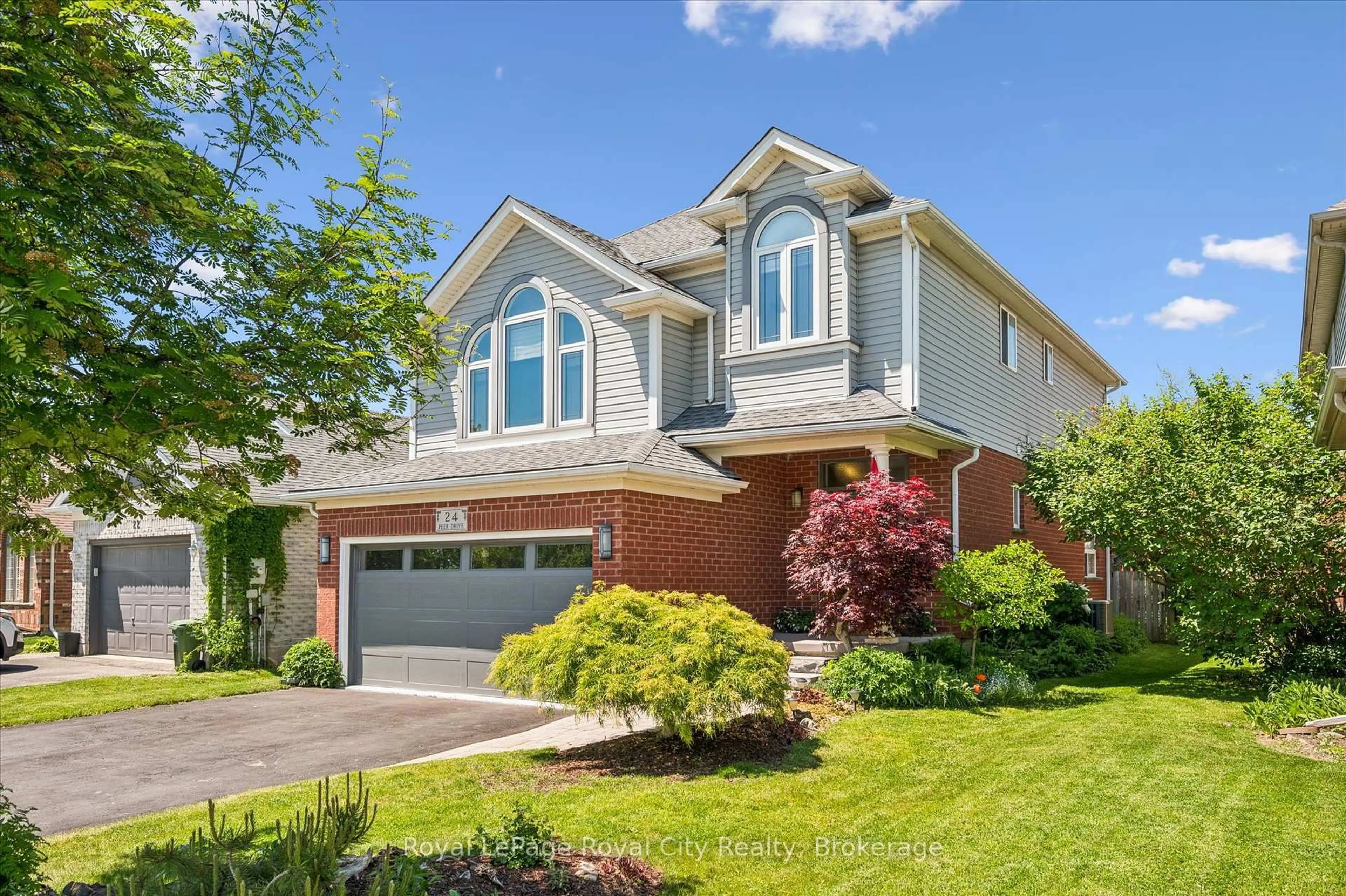 Home with brick exterior material, street for 24 Peer Dr, Guelph Ontario N1C 1H1