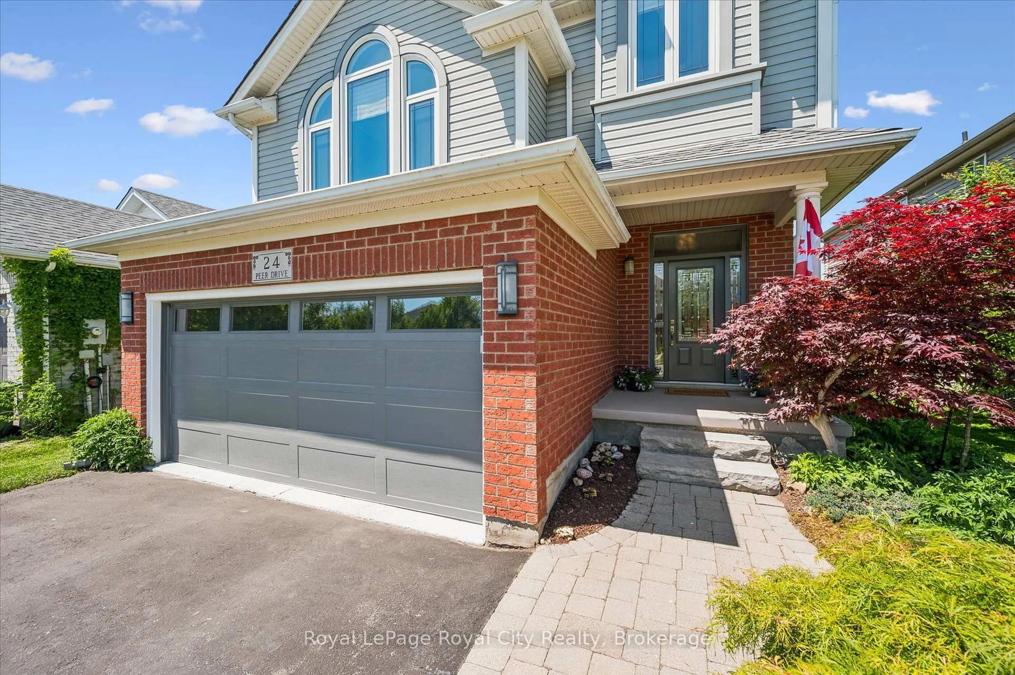 Home with brick exterior material, street for 24 Peer Dr, Guelph Ontario N1C 1H1