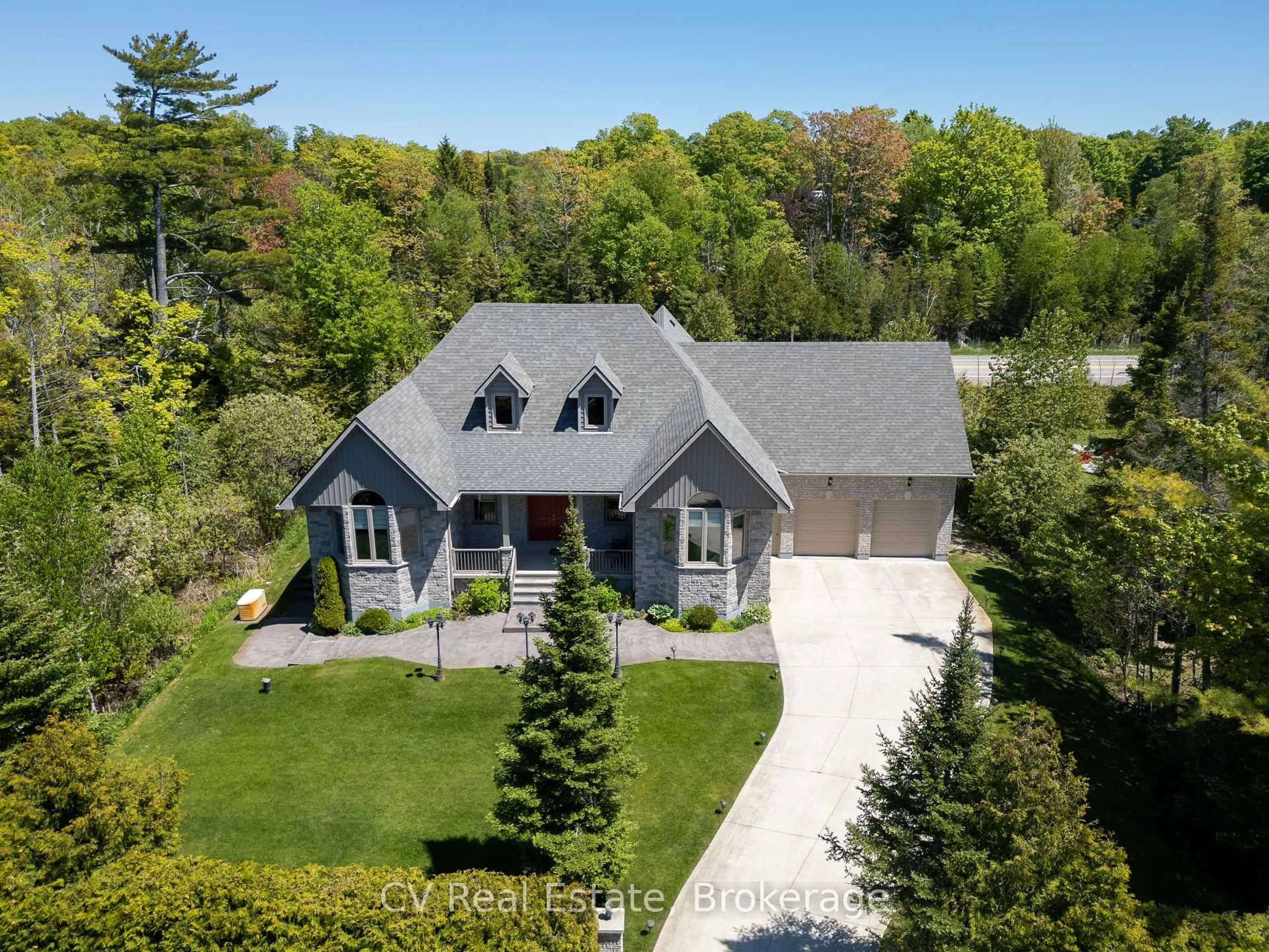 A pic from outside/outdoor area/front of a property/back of a property/a pic from drone, street for 180 St. Edmunds Cres, South Bruce Peninsula Ontario N0H 2G0