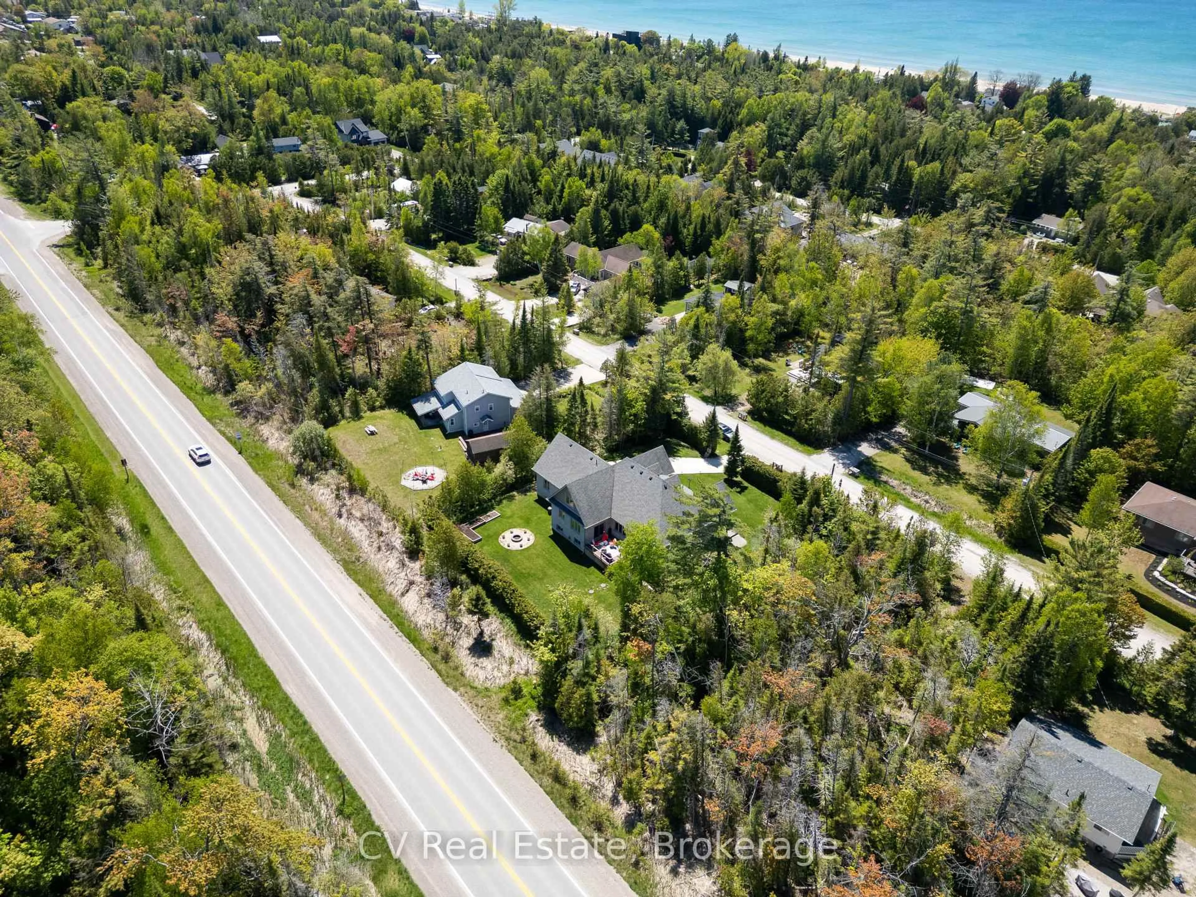 A pic from outside/outdoor area/front of a property/back of a property/a pic from drone, water/lake/river/ocean view for 180 St. Edmunds Cres, South Bruce Peninsula Ontario N0H 2G0