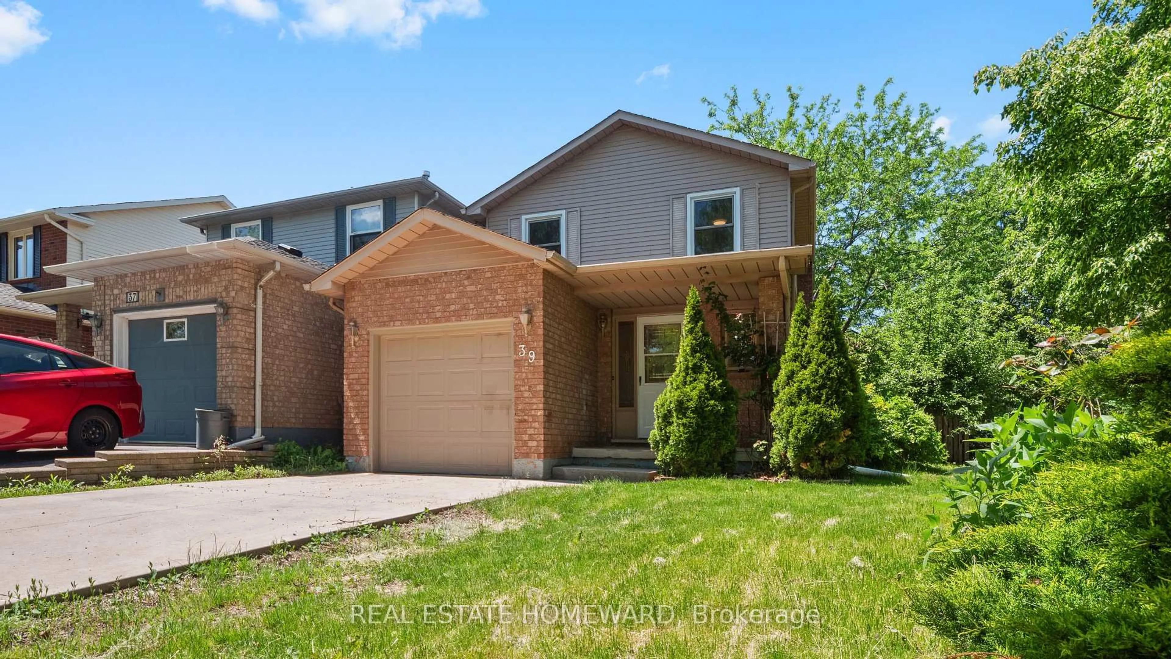 Home with brick exterior material, street for 39 Tomahawk Dr, Grimsby Ontario L3M 5G5