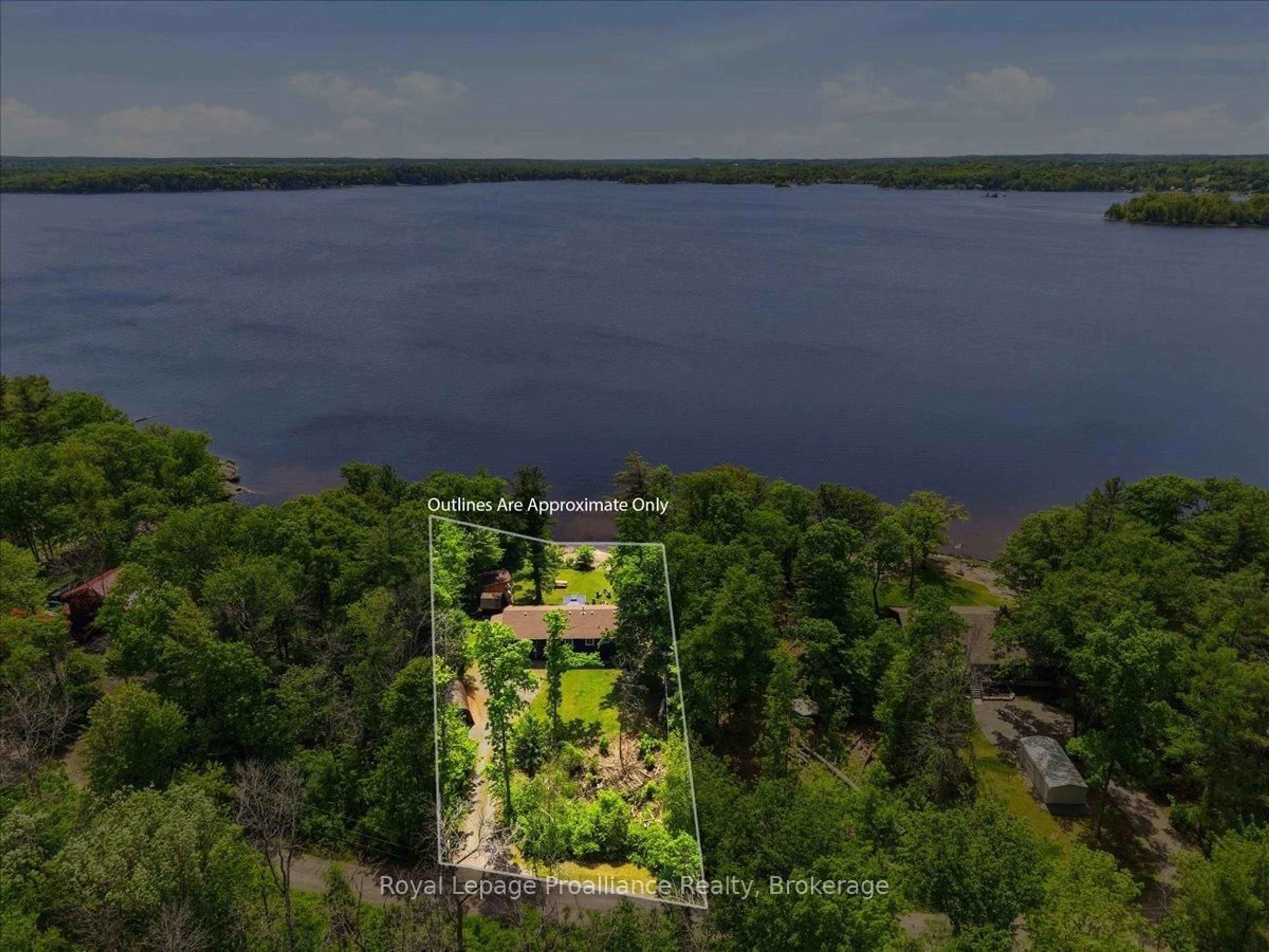 A pic from outside/outdoor area/front of a property/back of a property/a pic from drone, water/lake/river/ocean view for 304 Lakeview Lane, Tweed Ontario K0K 3J0