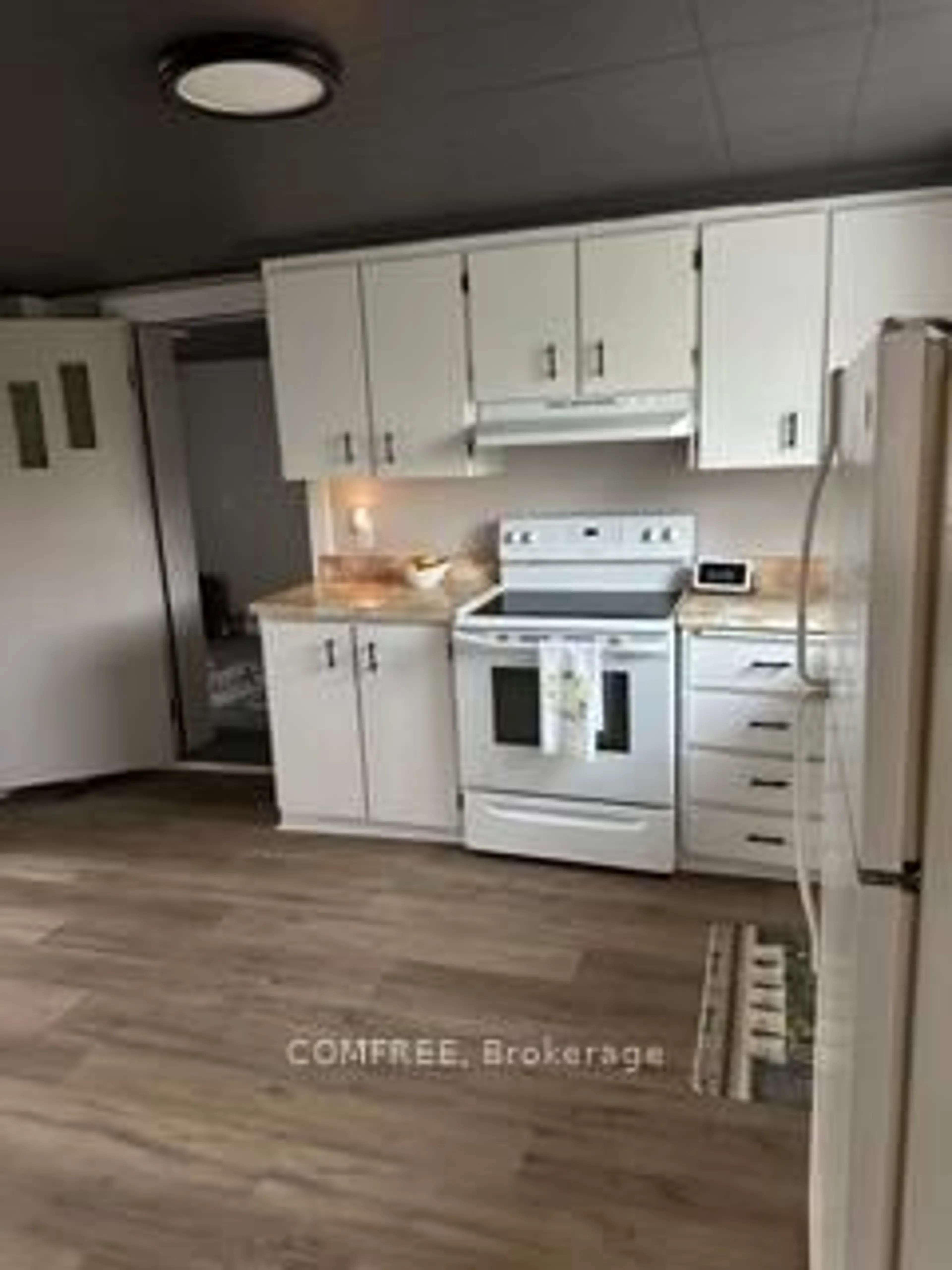Open concept kitchen, wood/laminate floor for 10 Neilson St, McNab/Braeside Ontario K7S 3G2