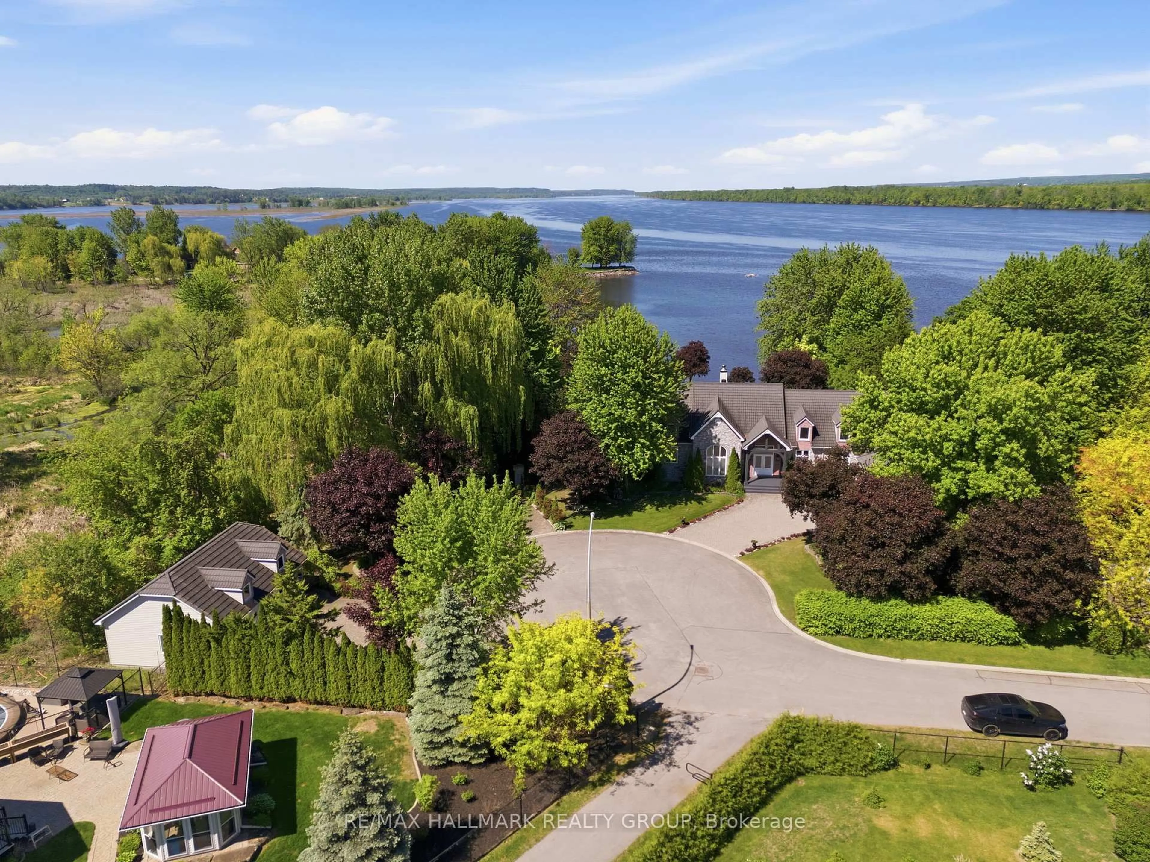 A pic from outside/outdoor area/front of a property/back of a property/a pic from drone, water/lake/river/ocean view for 2584 WOODS St, Clarence-Rockland Ontario K4K 1J2