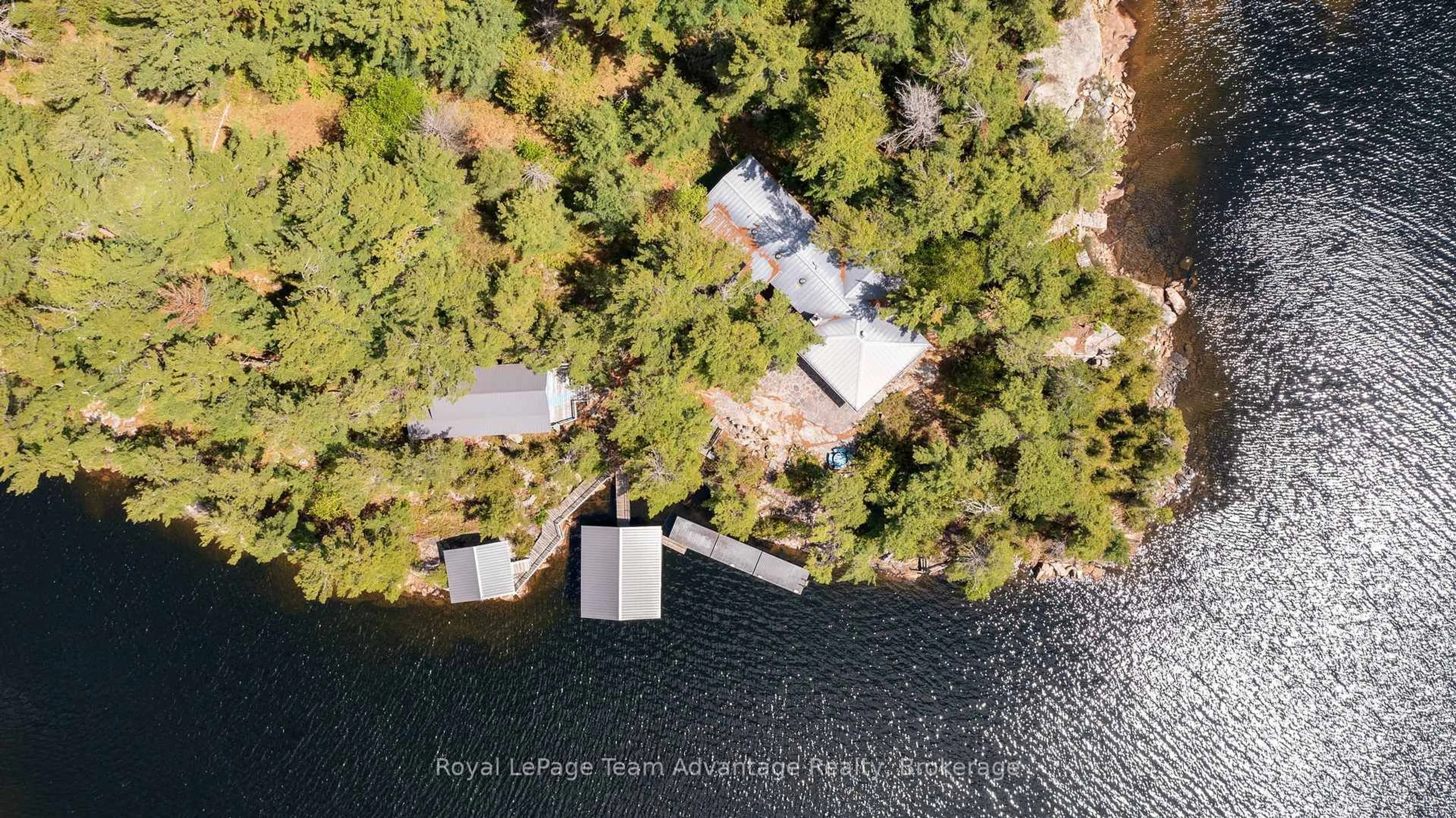 A pic from outside/outdoor area/front of a property/back of a property/a pic from drone, water/lake/river/ocean view for 1 A906 Island, The Archipelago Ontario P0G 1K0
