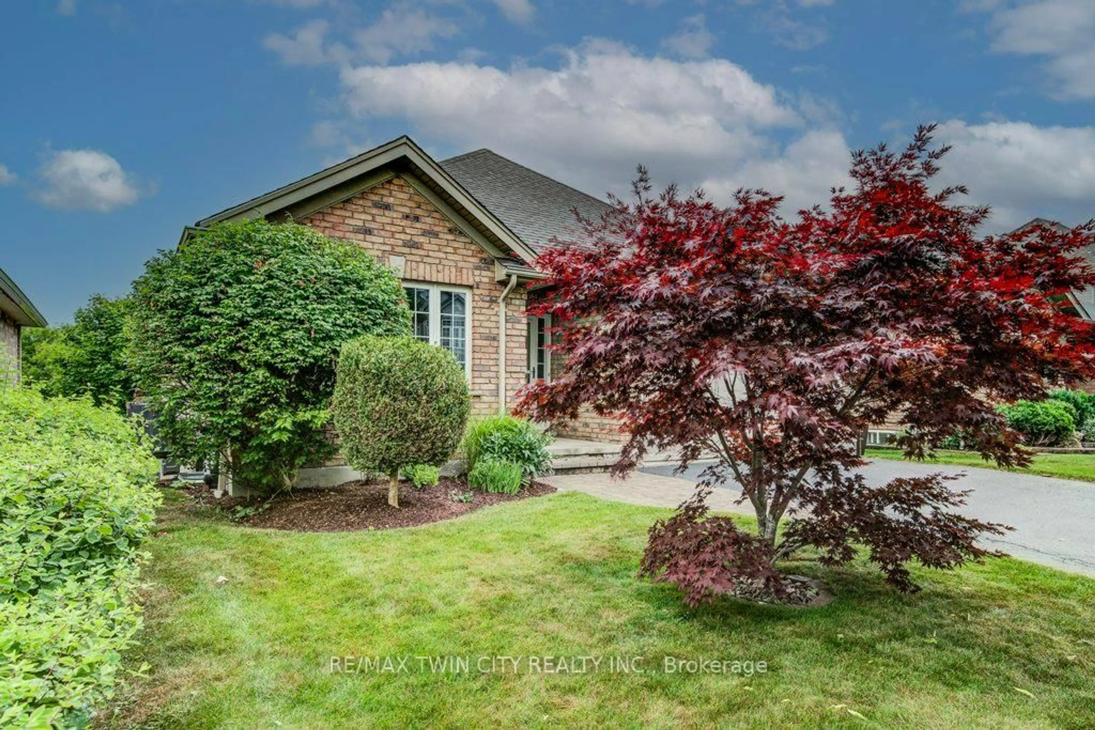 Home with brick exterior material, street for 670 Salzburg Dr, Waterloo Ontario N2V 2N8