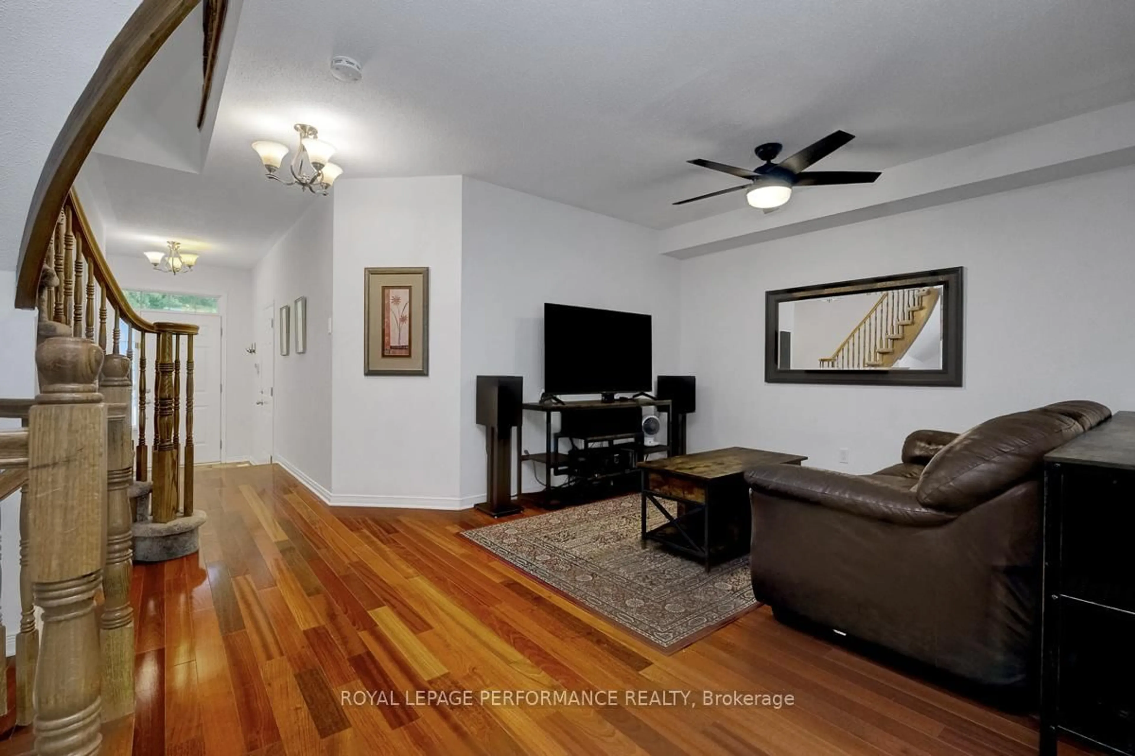 Living room with furniture, wood/laminate floor for 167 Duntroon Circ, Ottawa Ontario K1T 4C8